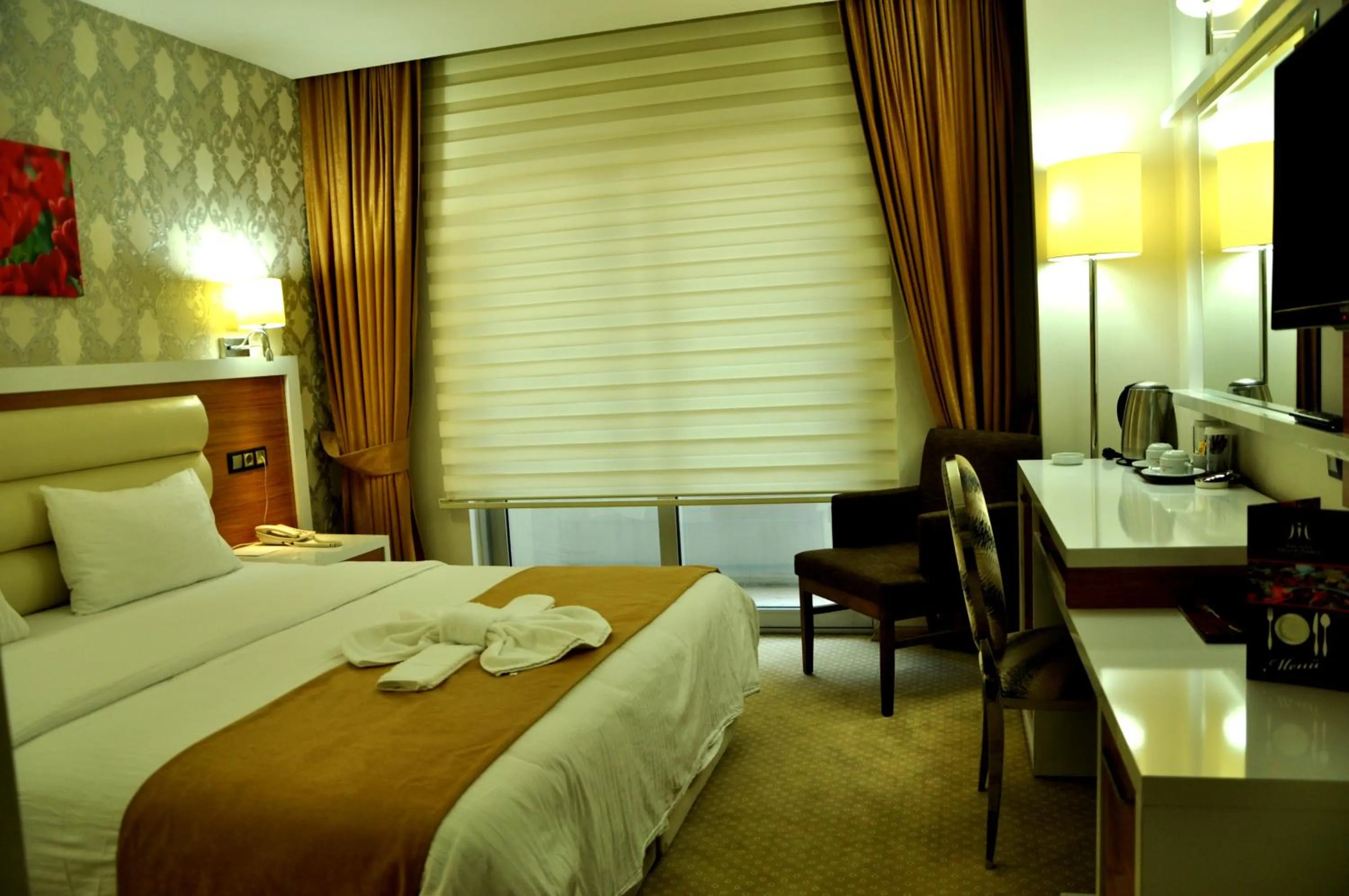 Bed in The Ancient Mesopotamia Hotel