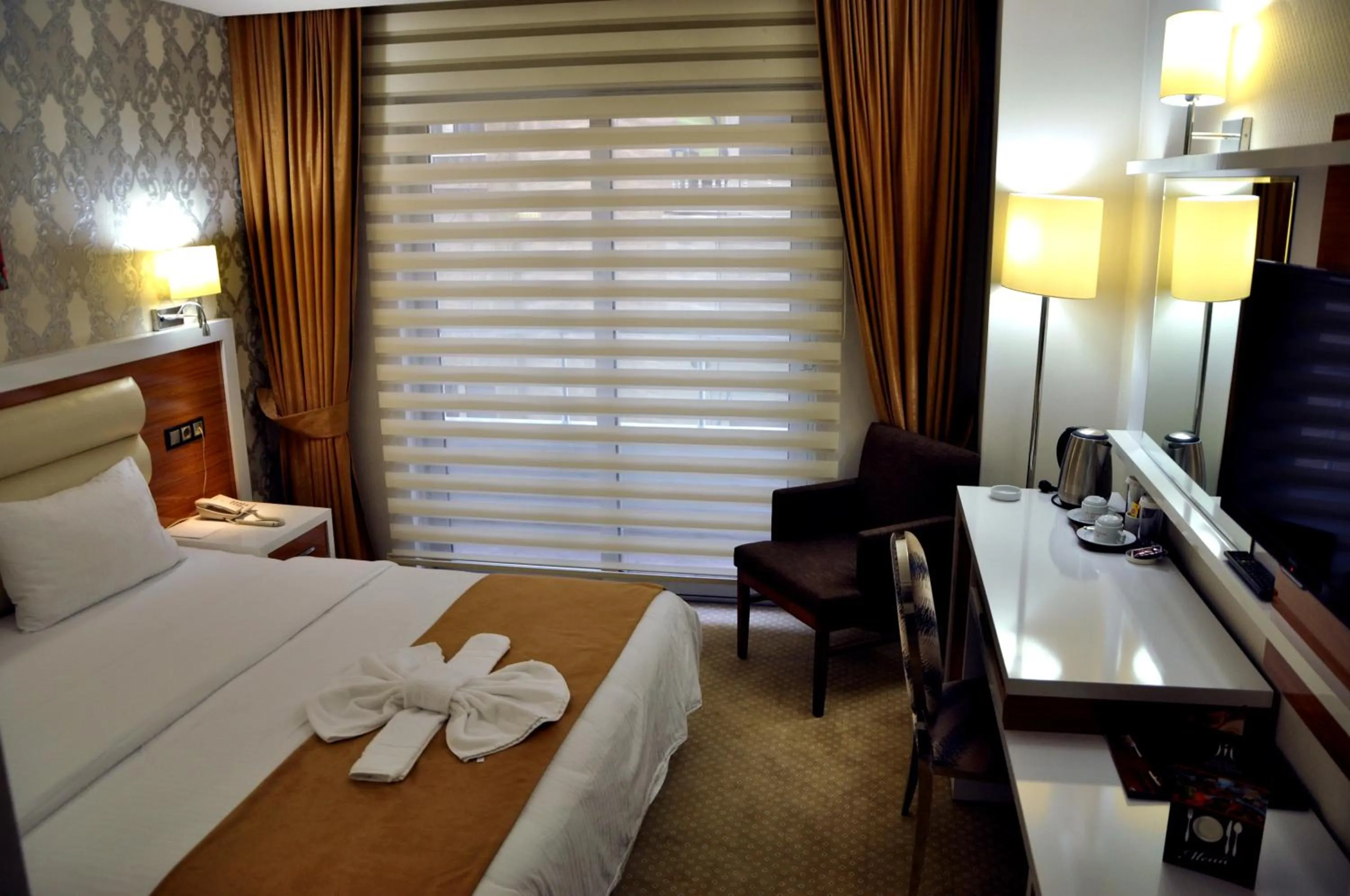 Photo of the whole room, Bed in The Ancient Mesopotamia Hotel