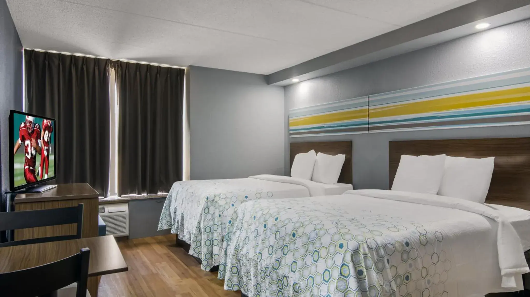 Photo of the whole room, Bed in HomeTowne Studios by Red Roof and Conference Center Chicago - N Aurora Naperville Photo of the whole room, Bed in HomeTowne Studios by Red Roof and Conference Center Chicago - N Aurora Naperville