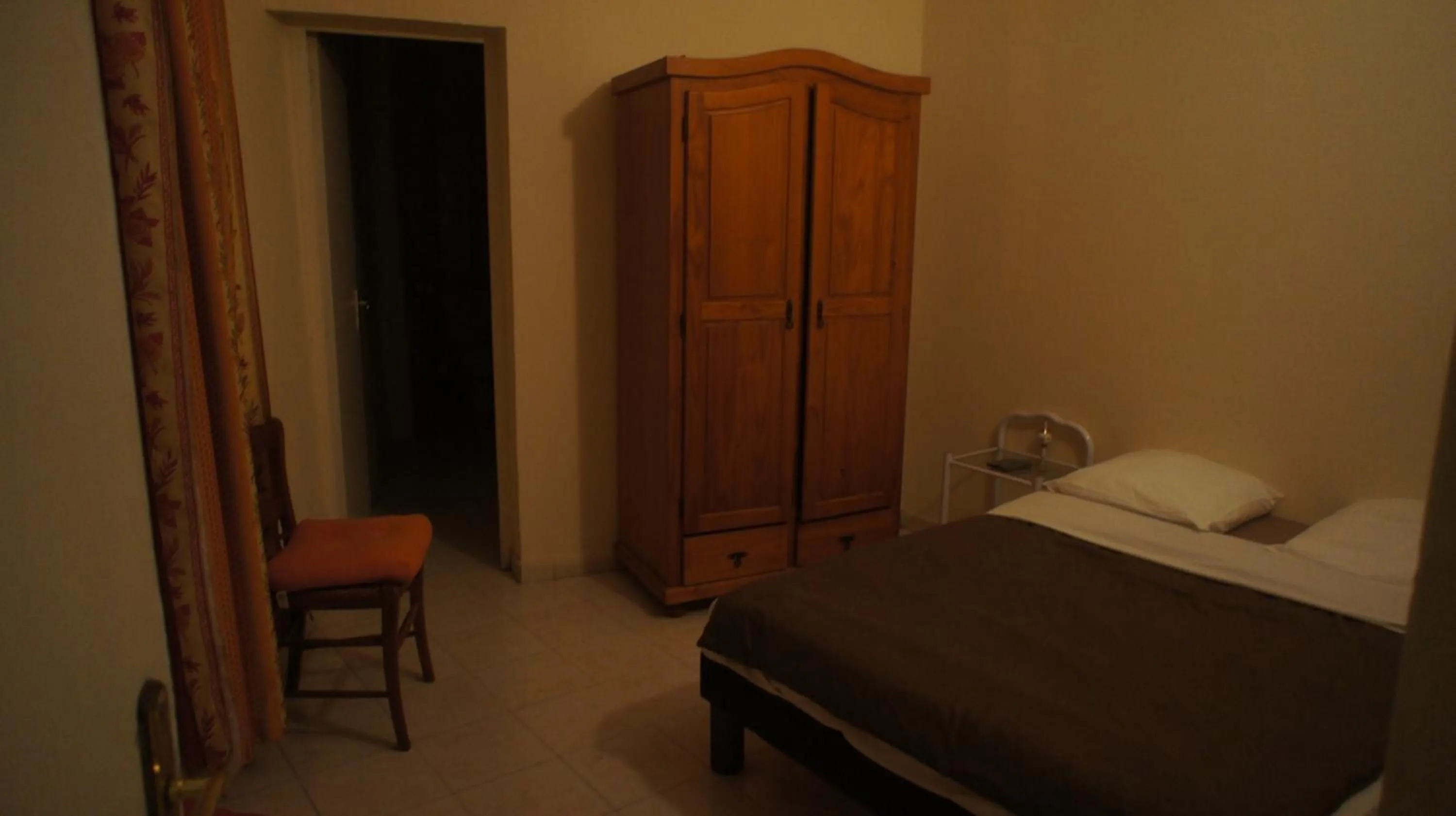 Bed in Hôtel de la Renaissance