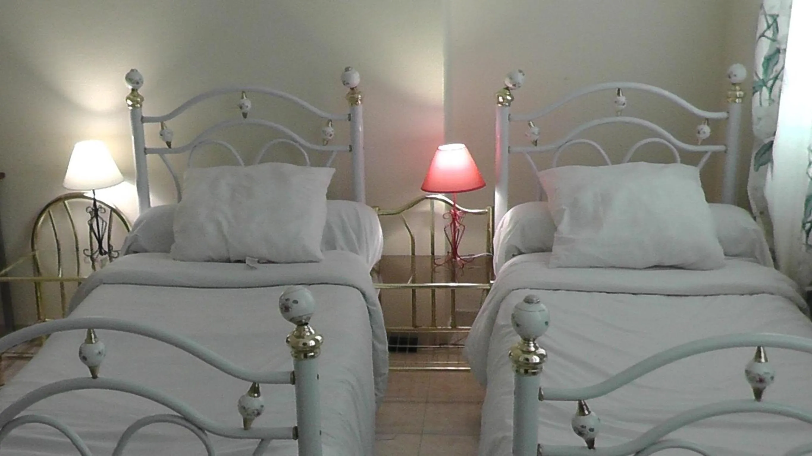 Bed in Hôtel de la Renaissance