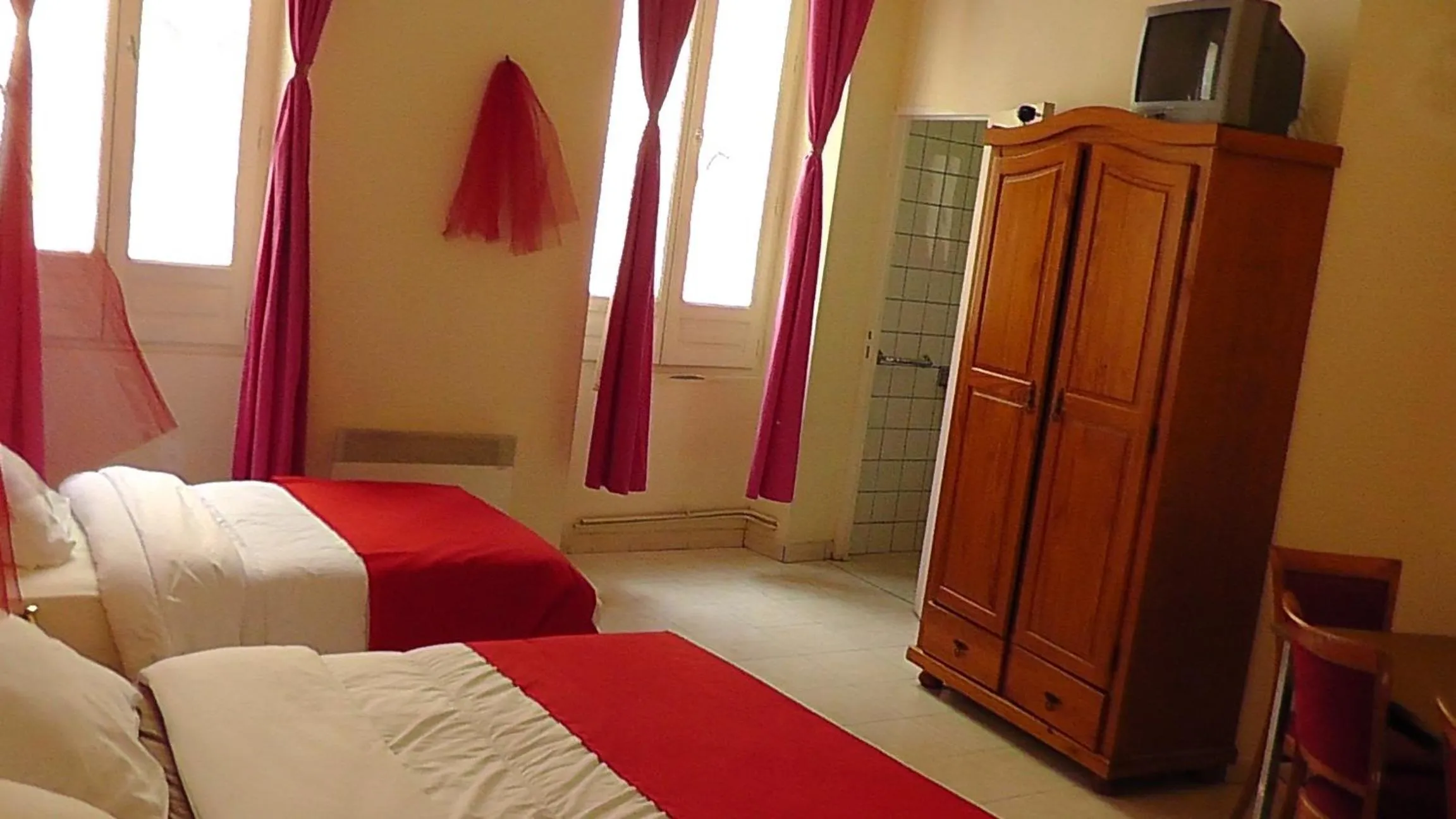 Bedroom in Hôtel de la Renaissance