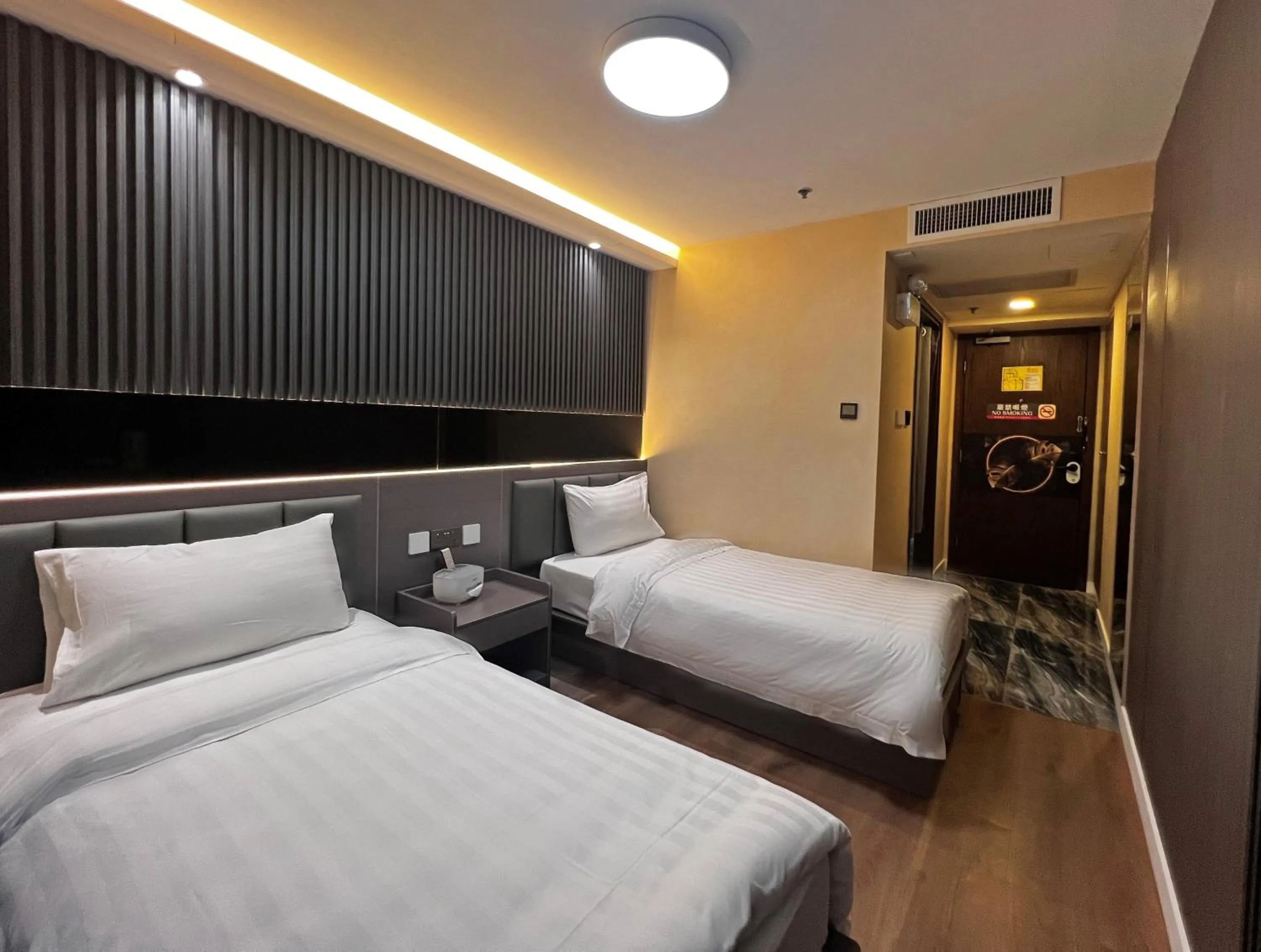 Bed in Hennessy Hotel