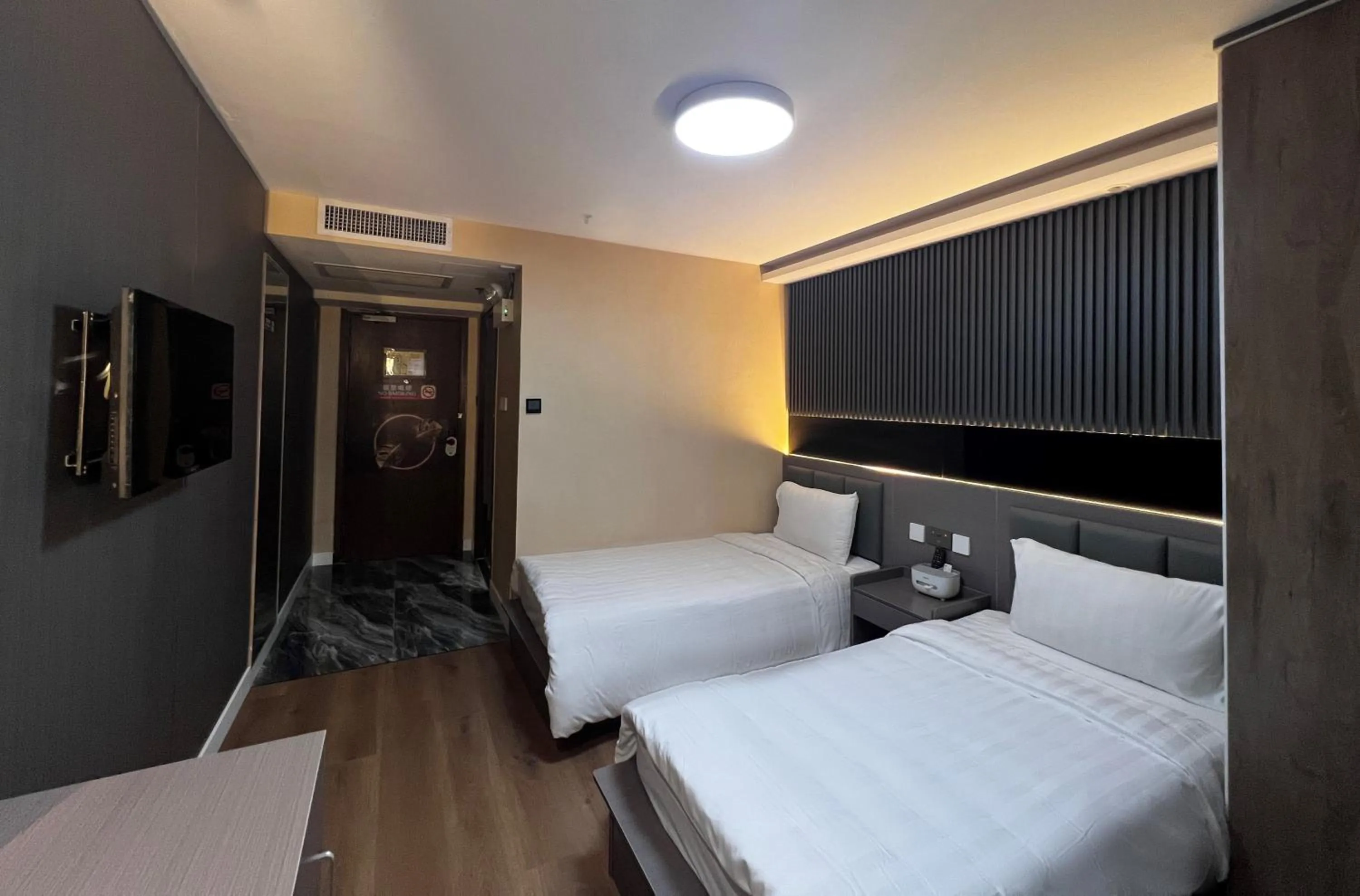 Bed in Hennessy Hotel