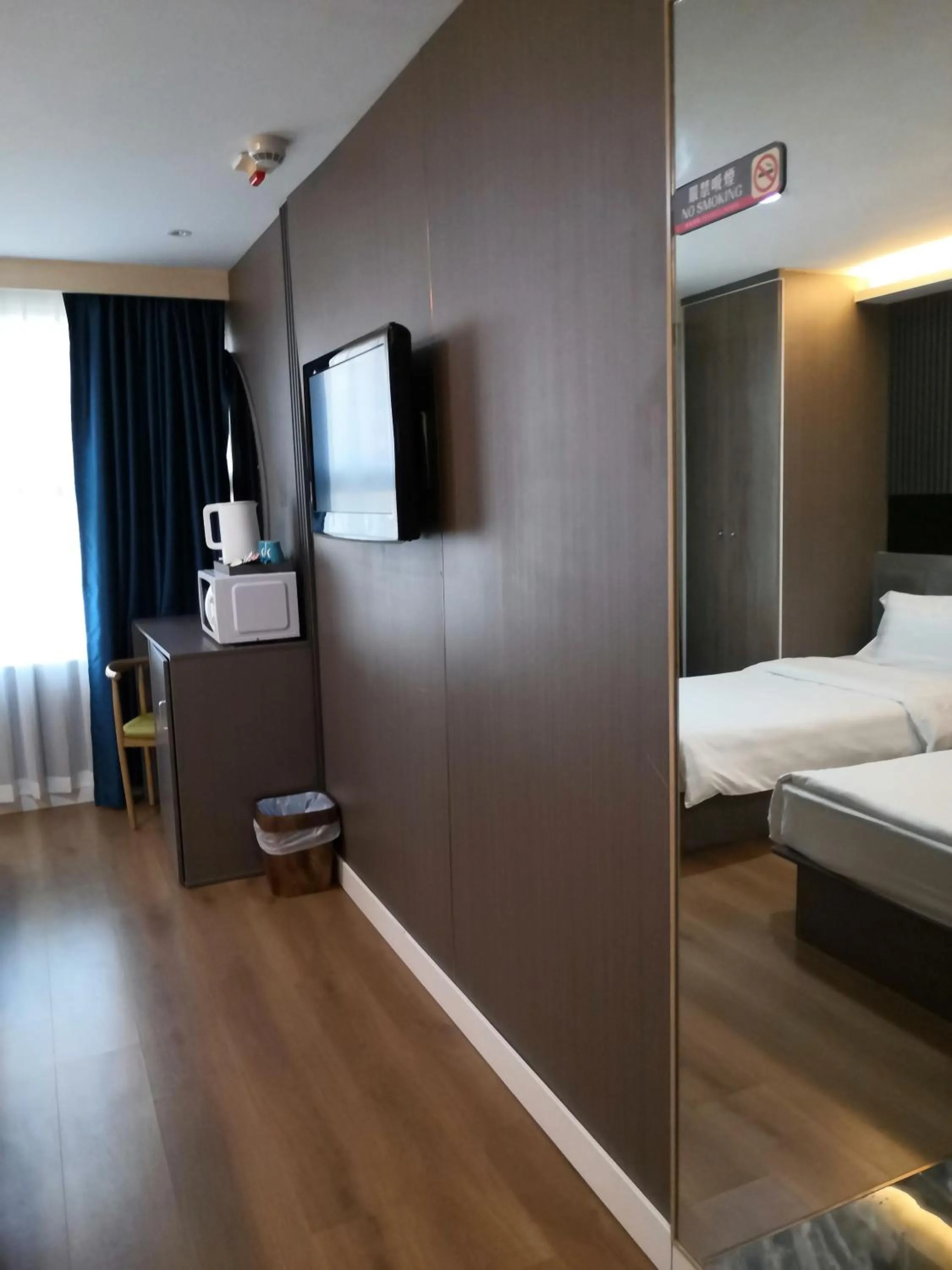 Bed in Hennessy Hotel