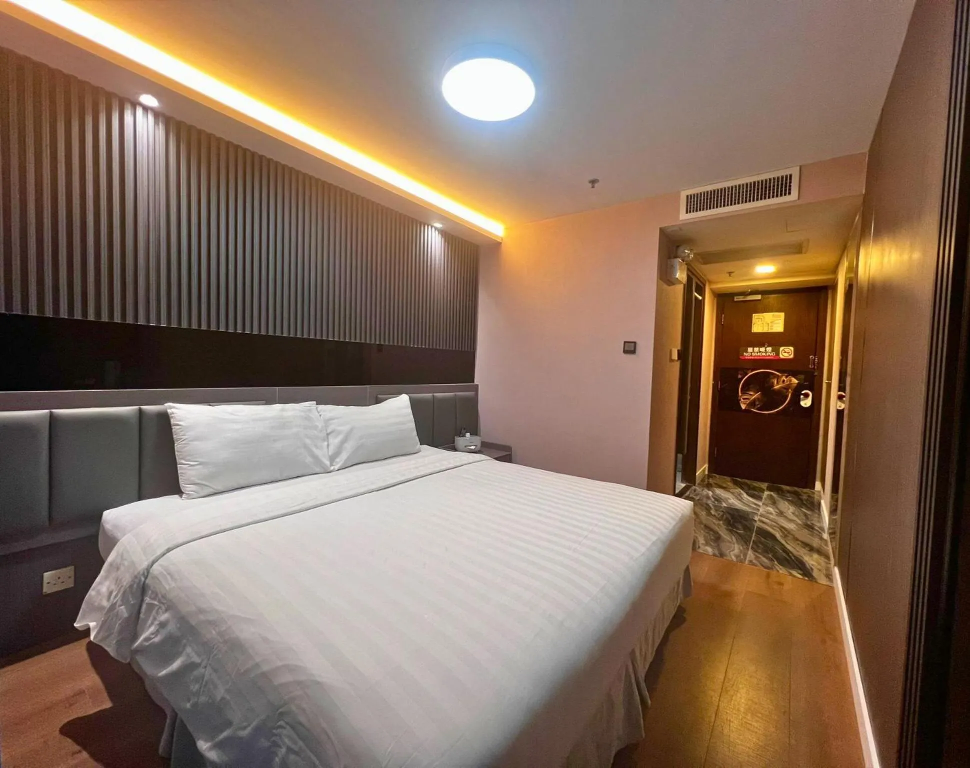 Bed in Hennessy Hotel