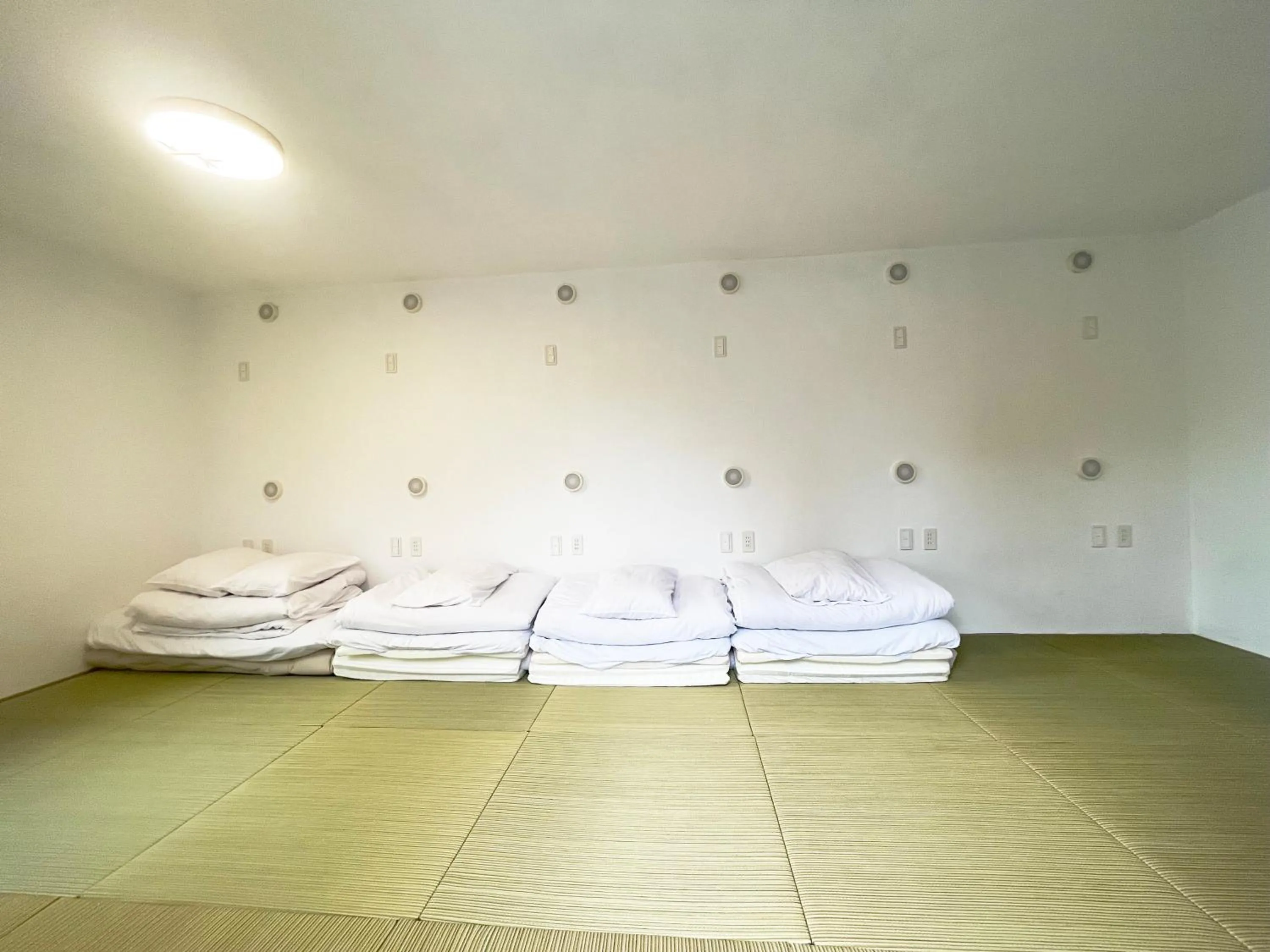 Bed in Hananosato Hotel 池袋本店