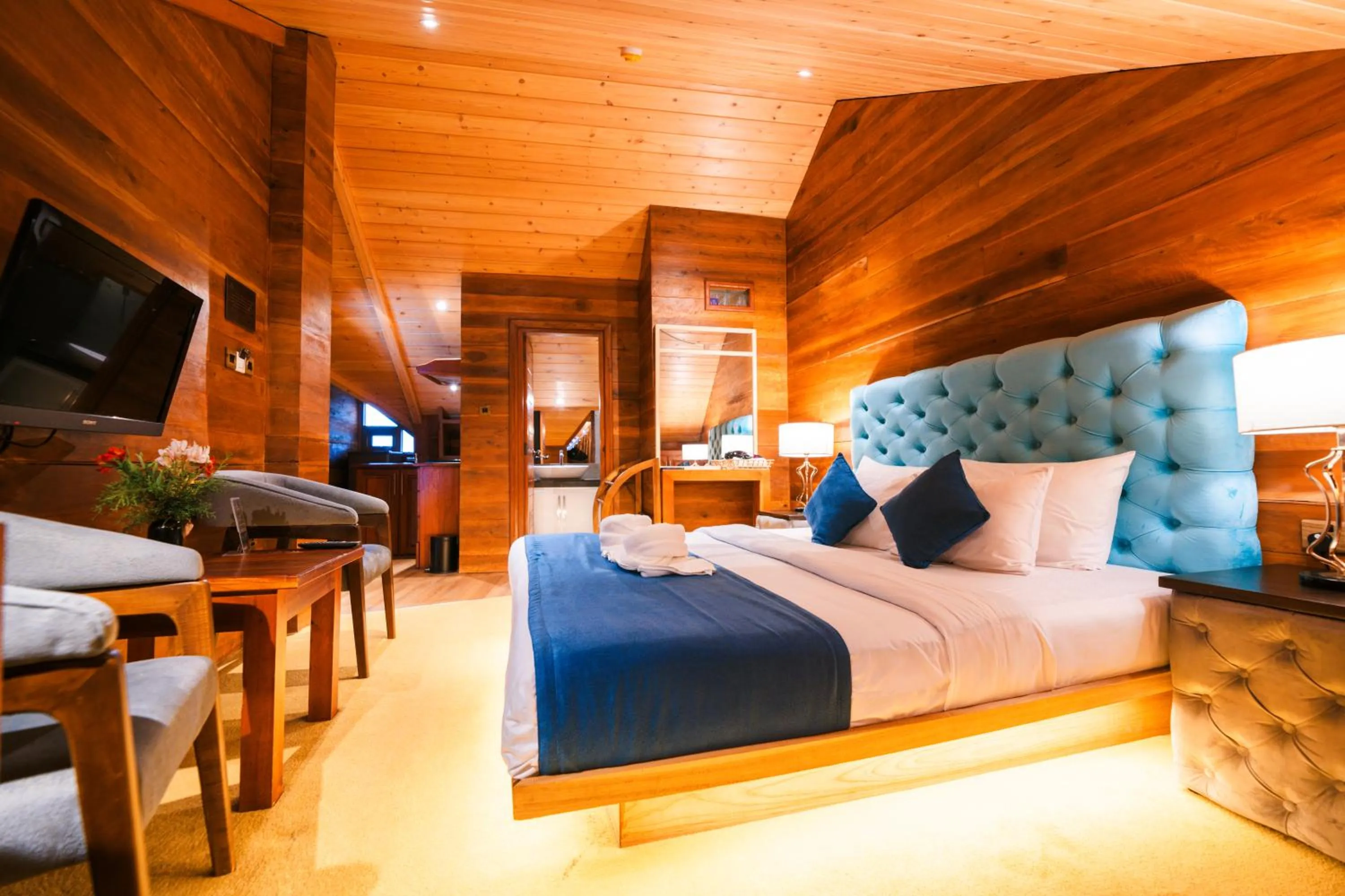 Communal lounge/ TV room, Bed in Baron Luxury Boutique