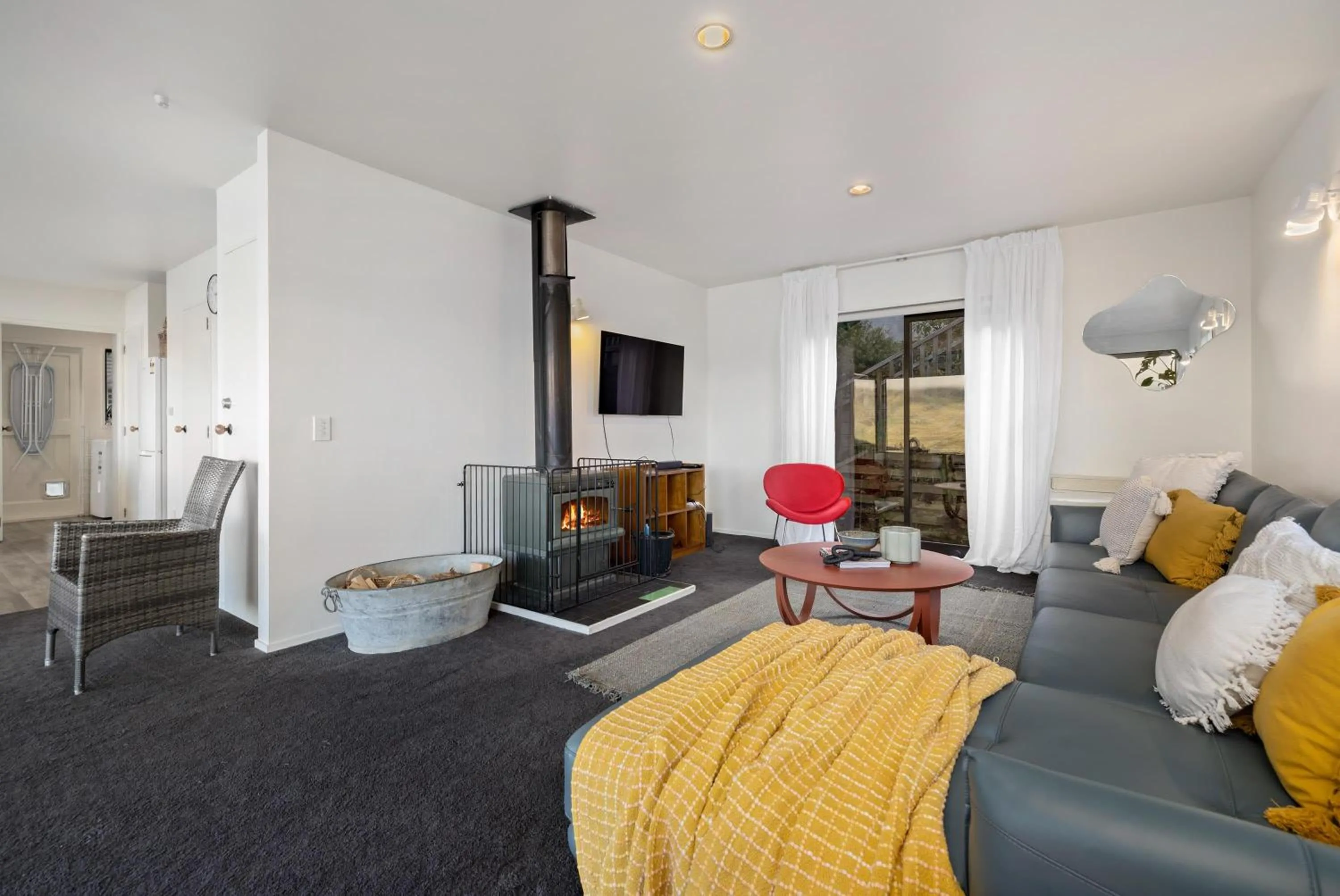 Communal lounge/ TV room in Remarkable Alpine Holiday Home