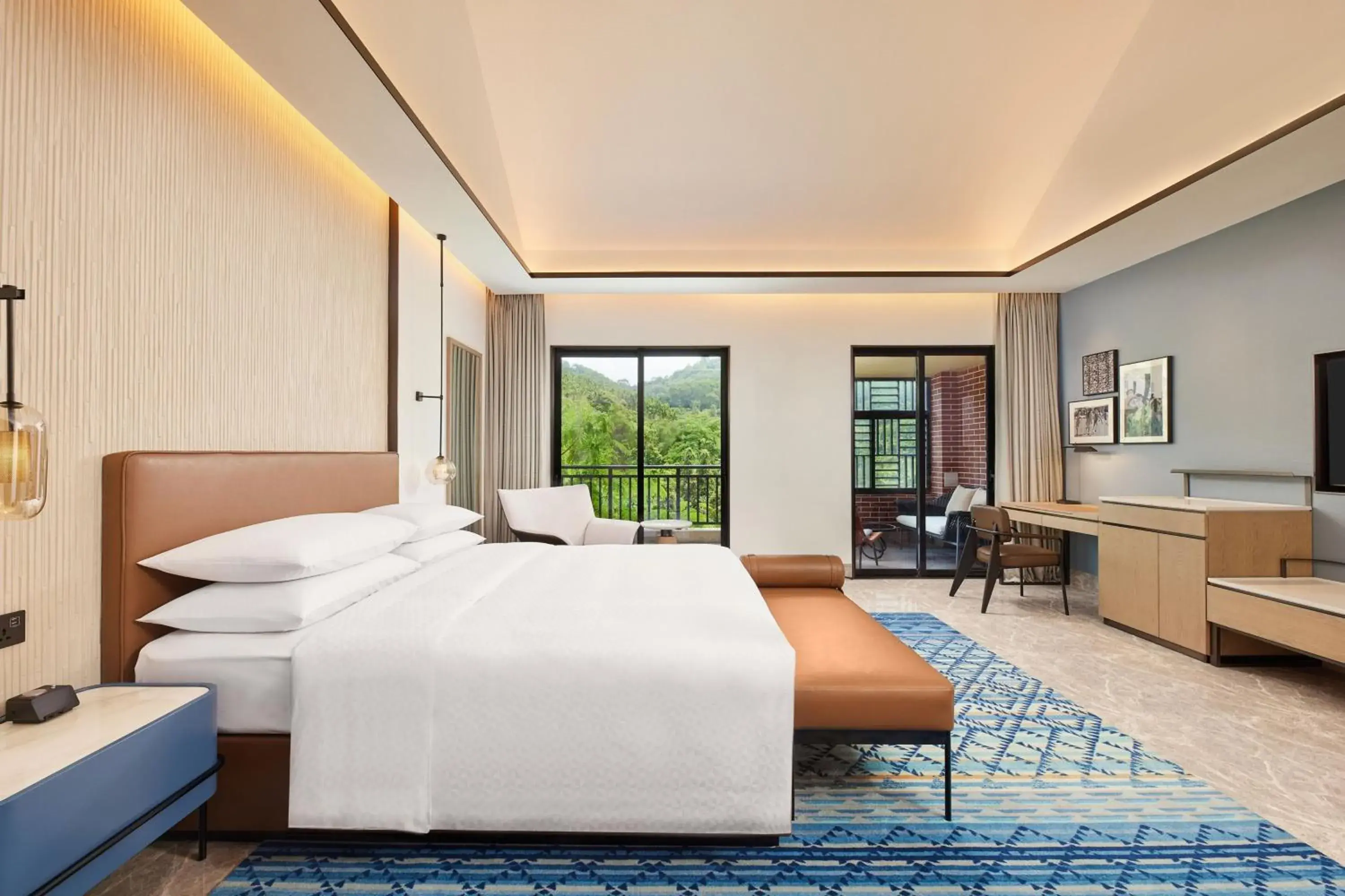 Deluxe King Room with Balcony and Garden View in Four Points by Sheraton Hainan, Qiongzhong Deluxe King Room with Balcony and Garden View in Four Points by Sheraton Hainan, Qiongzhong