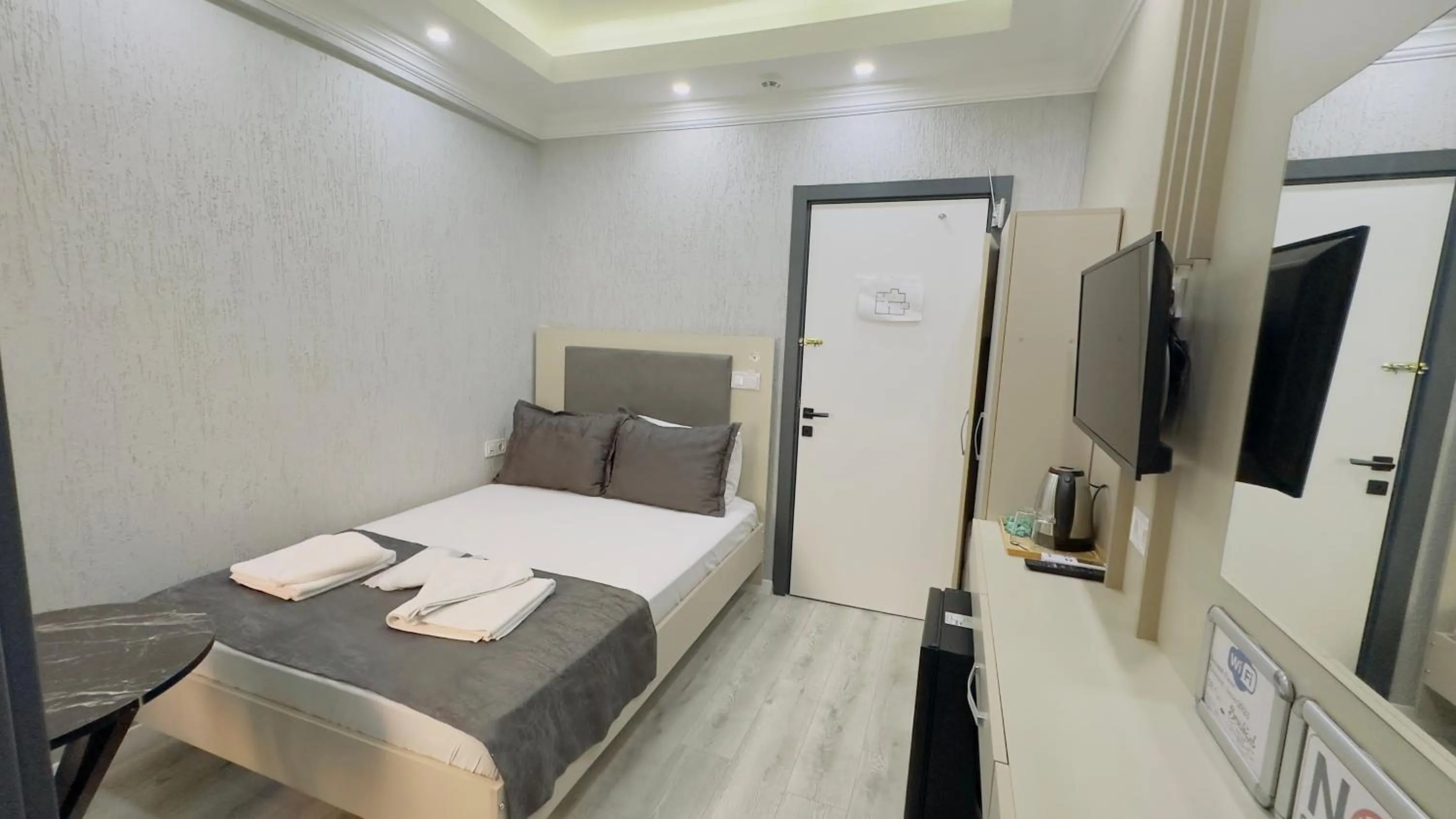 Bed in La Mer Old City Hotel