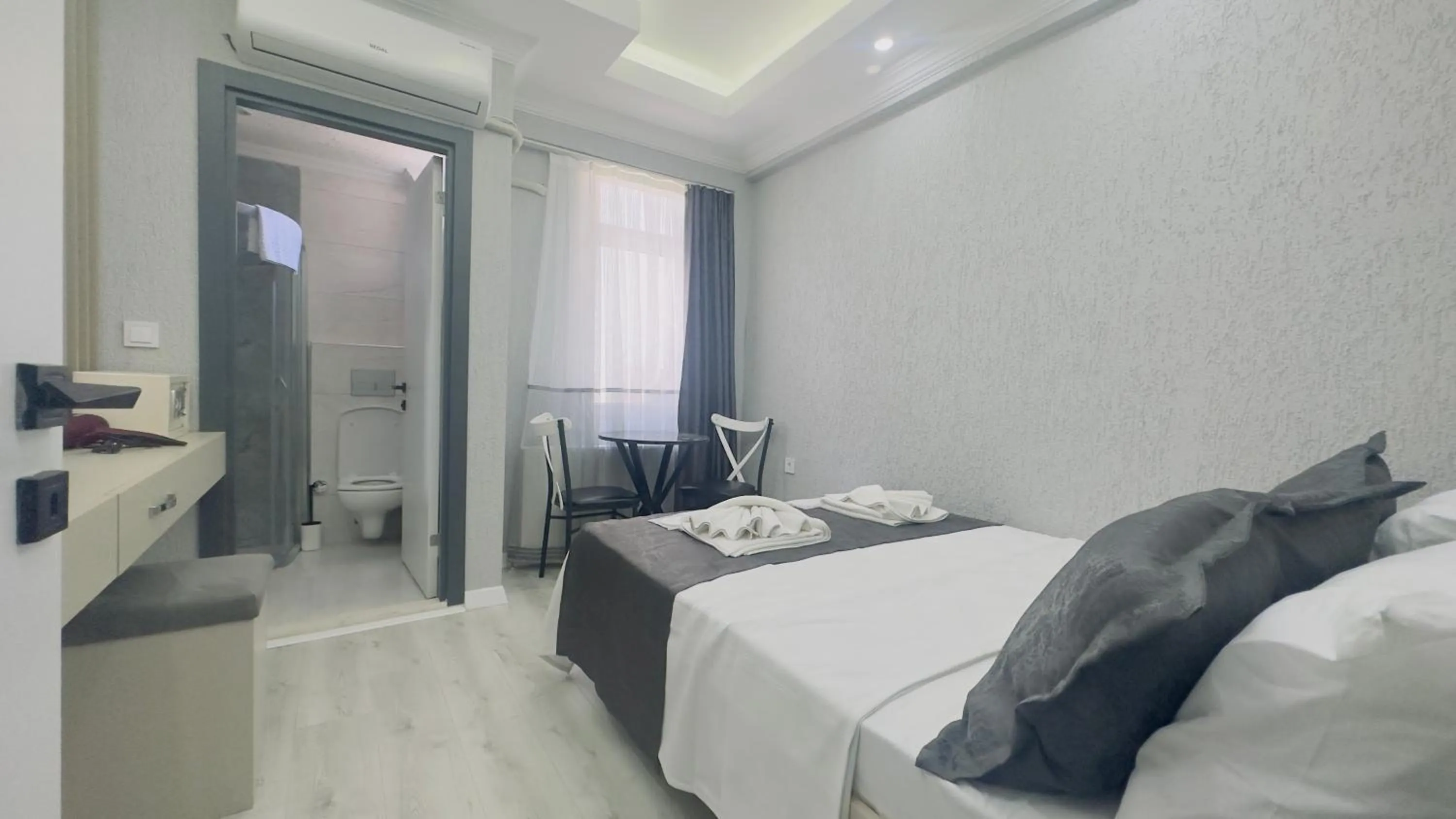 Bed in La Mer Old City Hotel