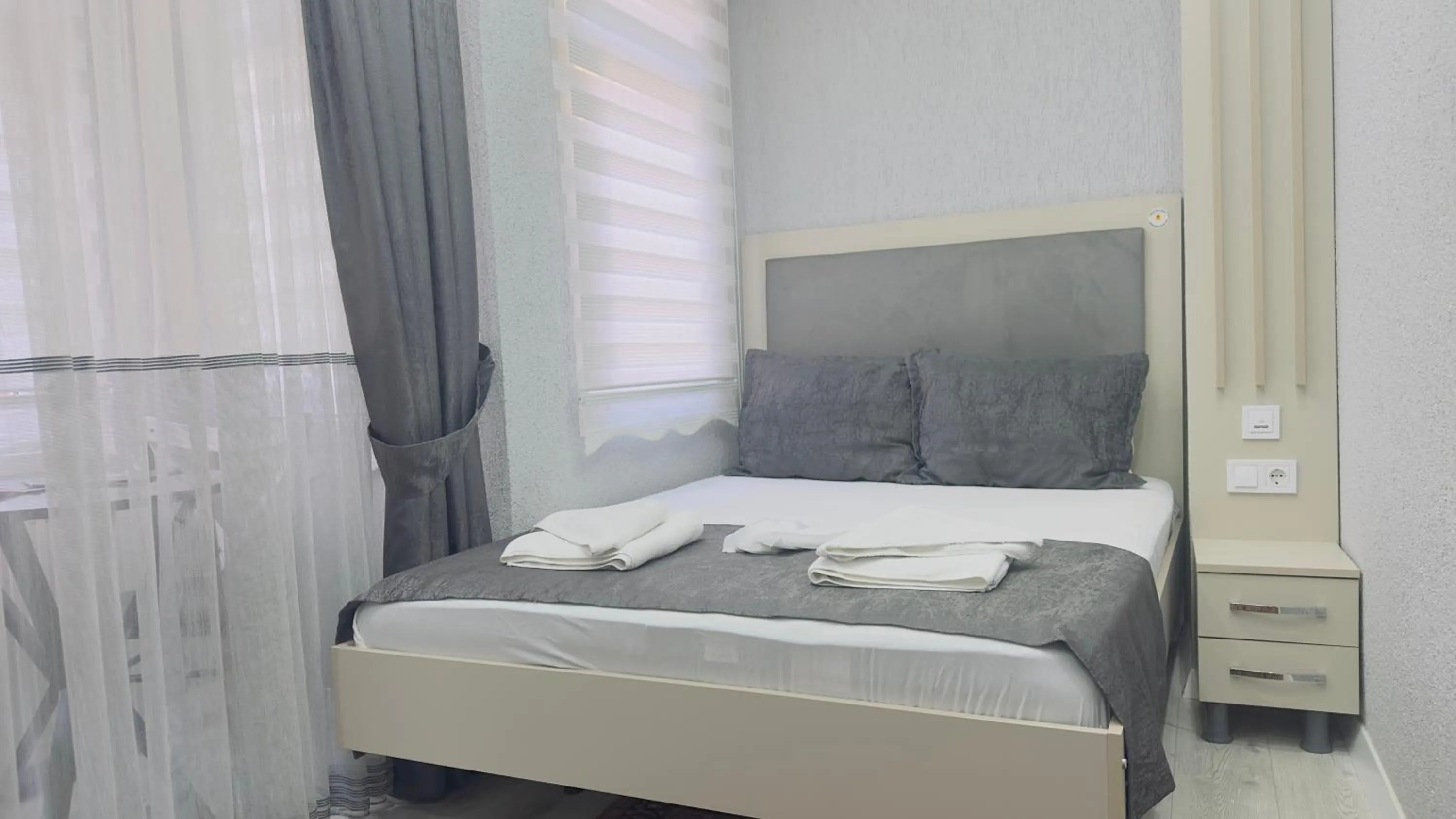 Bed in La Mer Old City Hotel