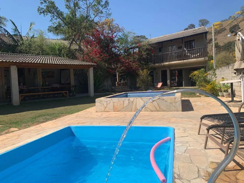 Swimming pool in Pousada Rota dos Pássaros