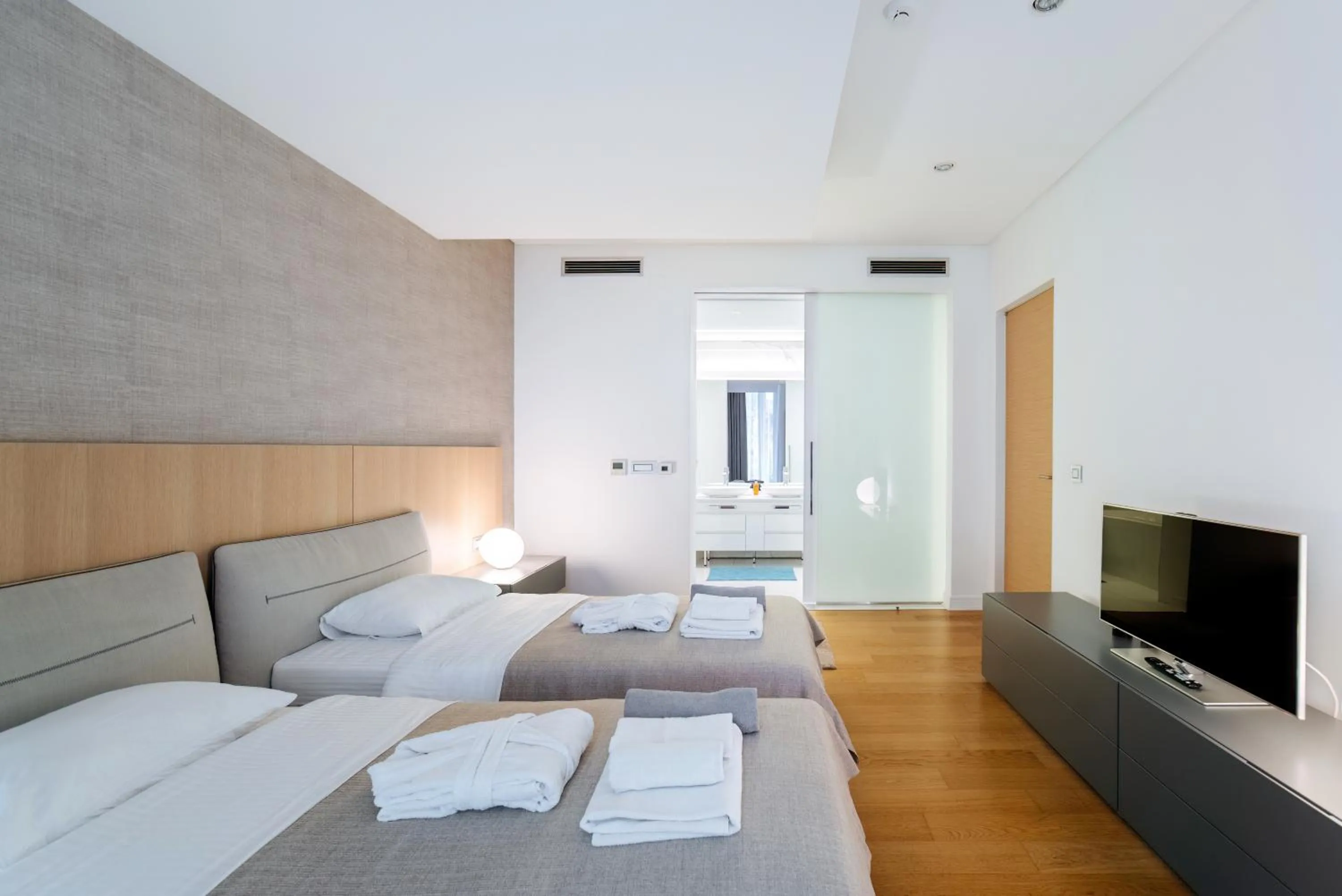 Bed in Luxury Waterfront Villa at Dukly Gardens