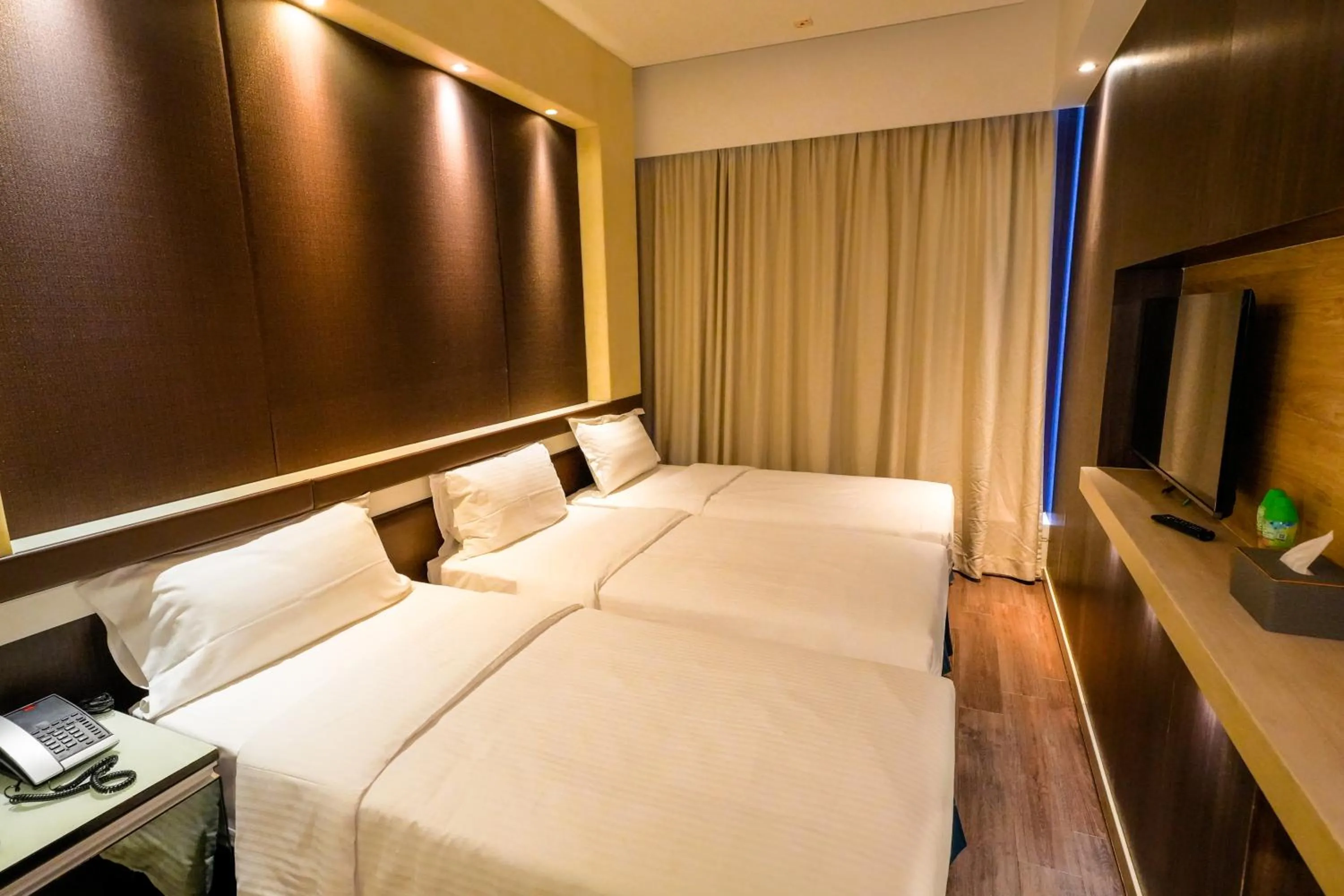 Bed in Epoch Hotel
