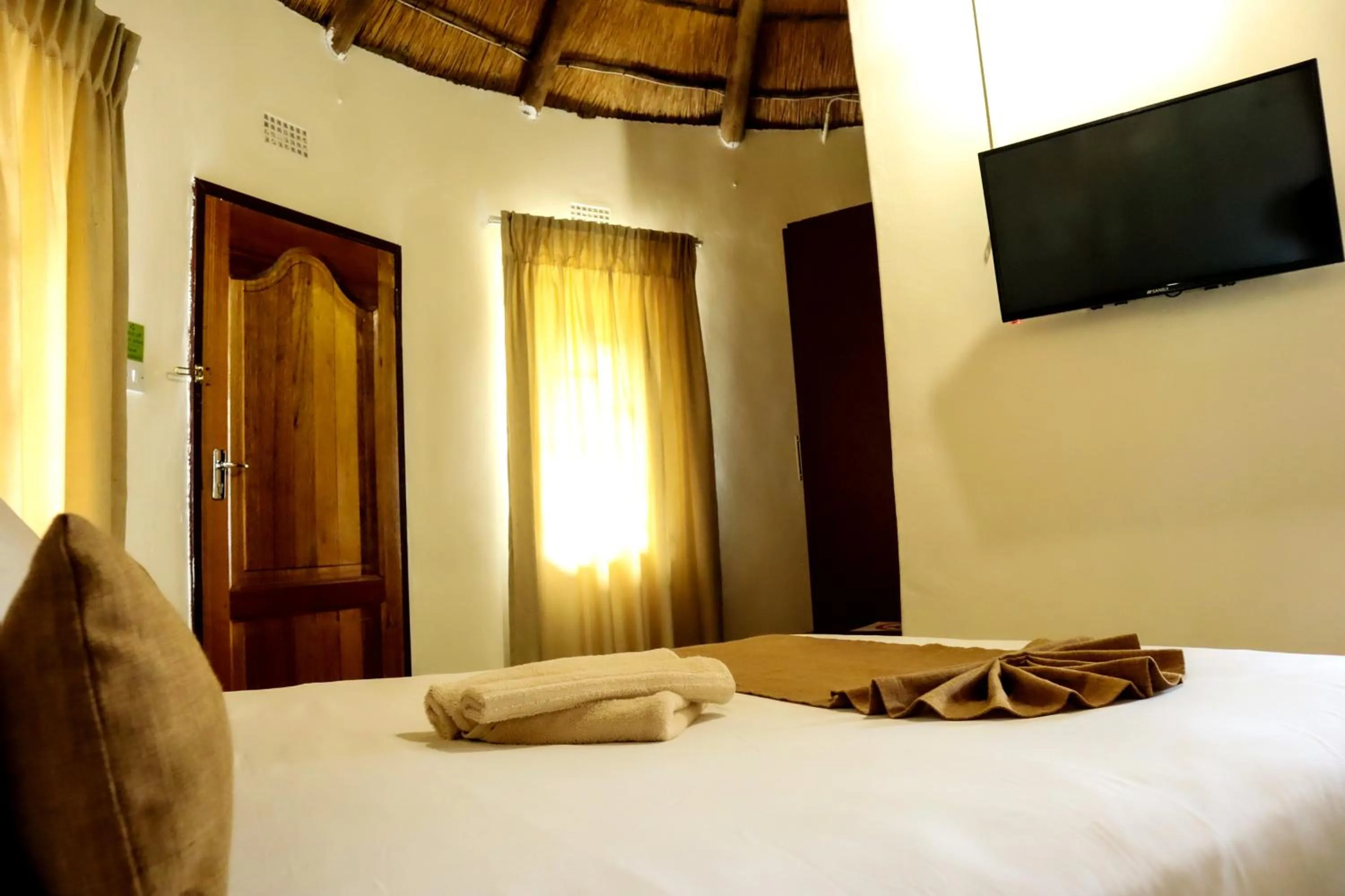 Bed in Nkanga Hotel