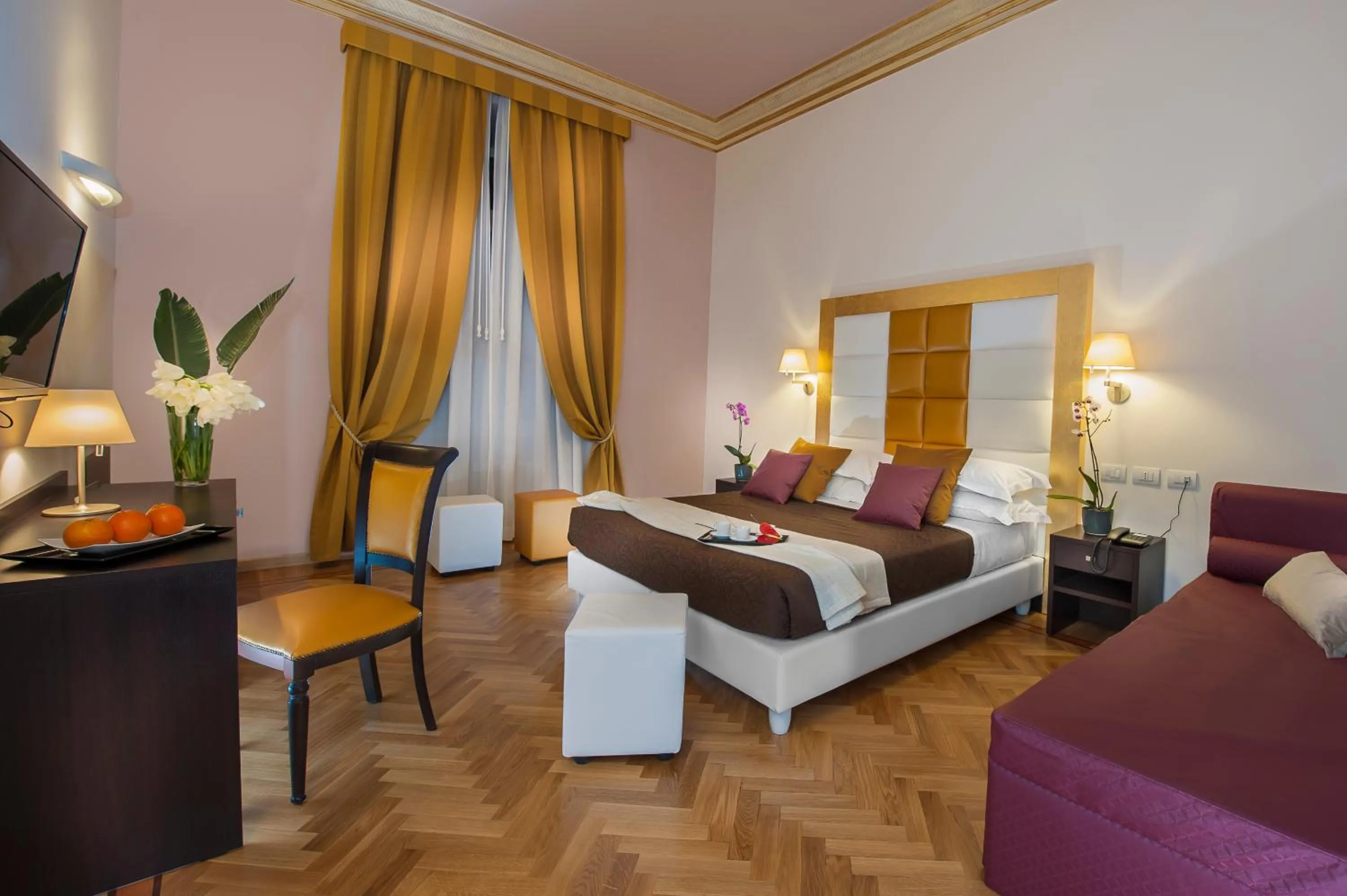 Photo of the whole room, Bed in DVE Suite Rome