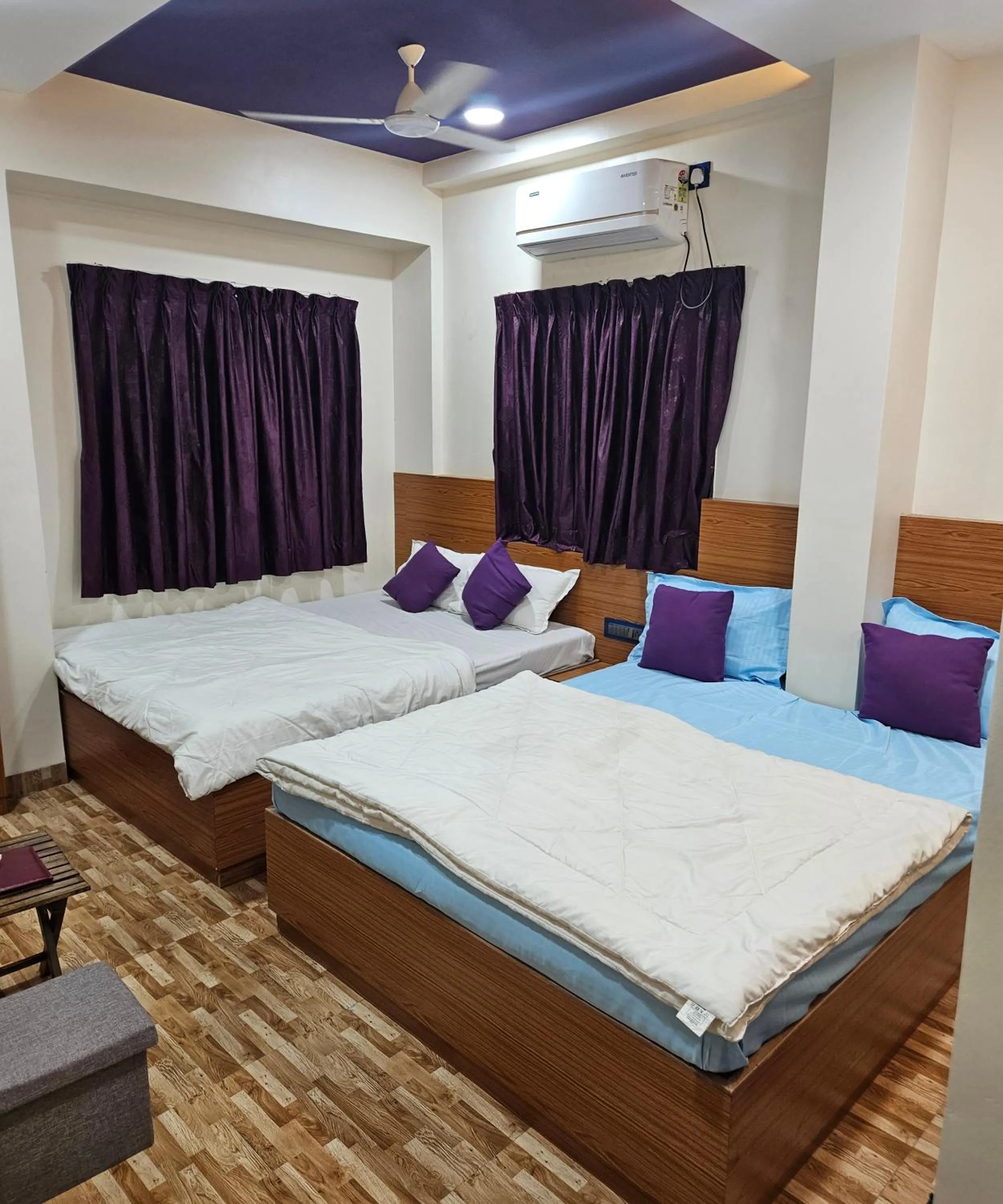 Bed in Hotel Sai Dakshina Inn & The Fern Restaurant