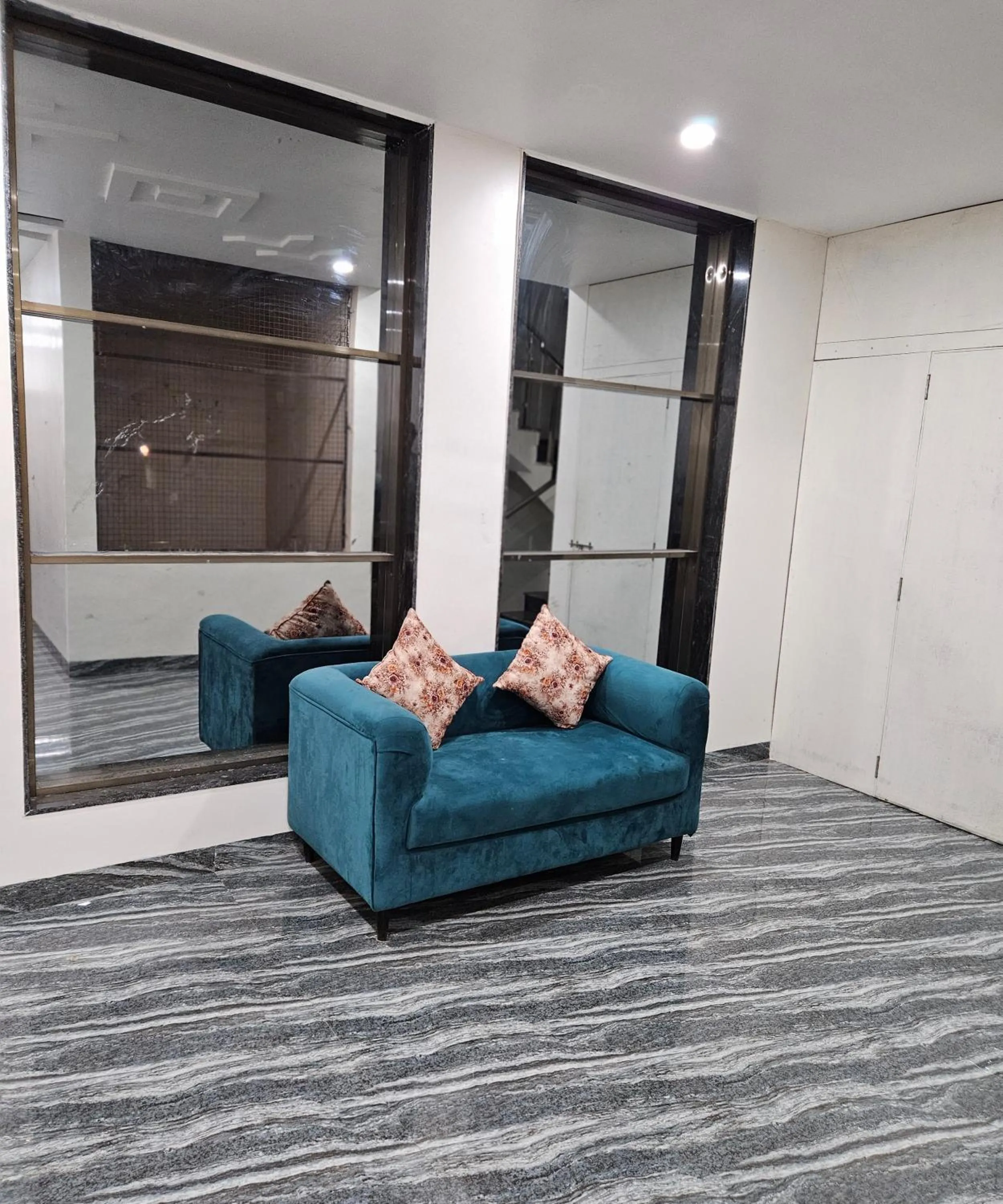 Seating area in Hotel Sai Dakshina Inn & The Fern Restaurant