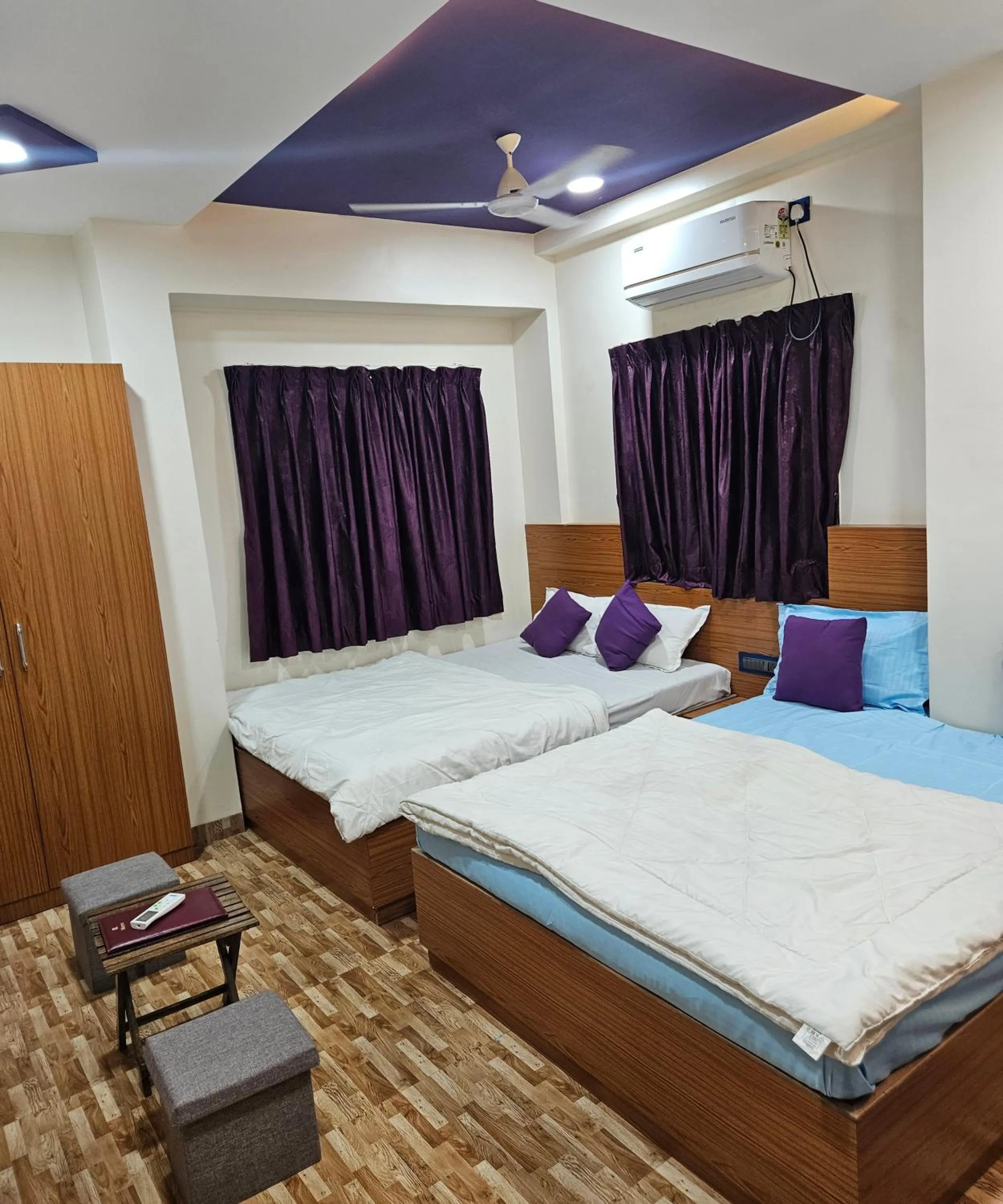 Bed in Hotel Sai Dakshina Inn & The Fern Restaurant