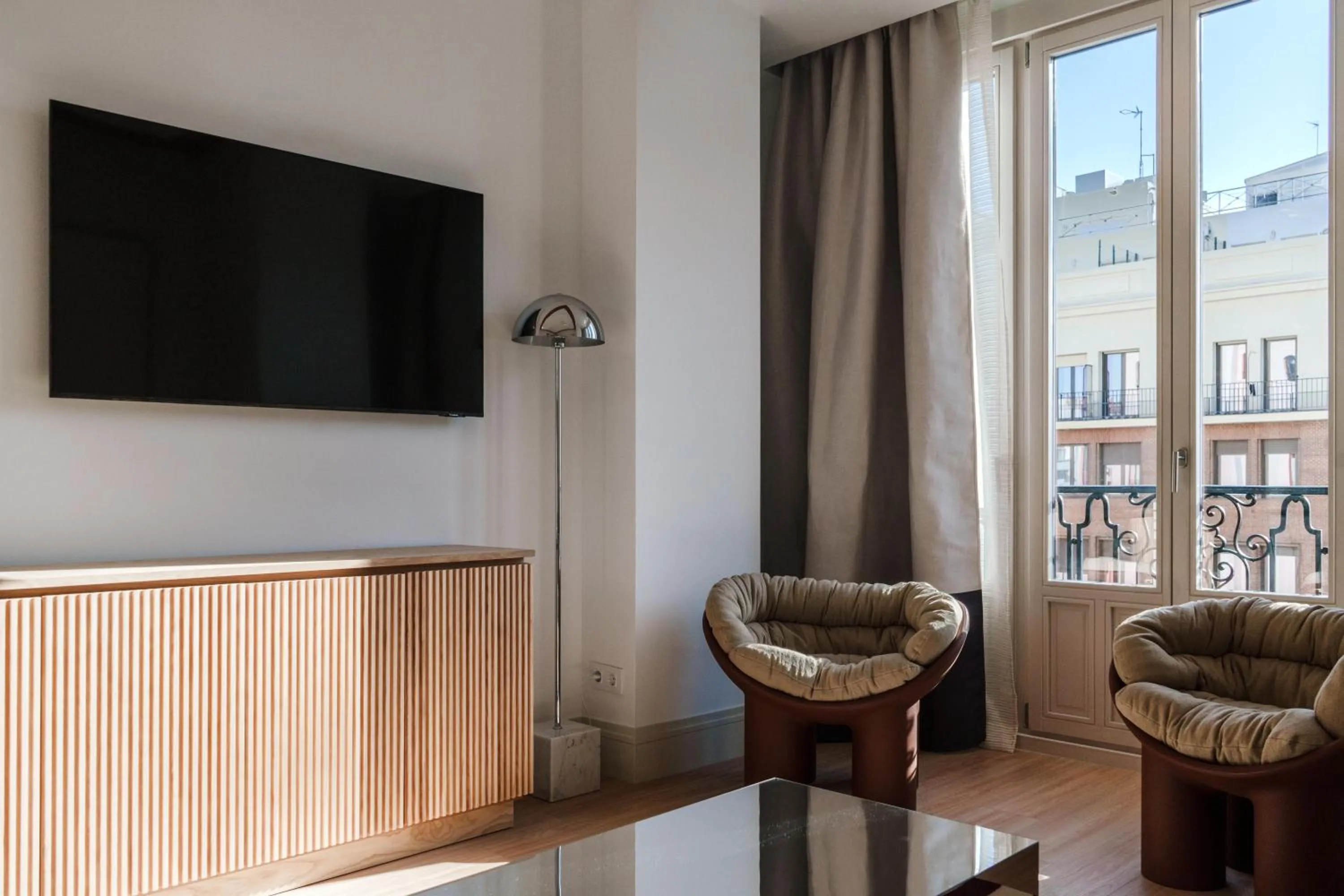 TV and multimedia in Apartamentos Soho Boutique Hoy No Me Puedo Levantar