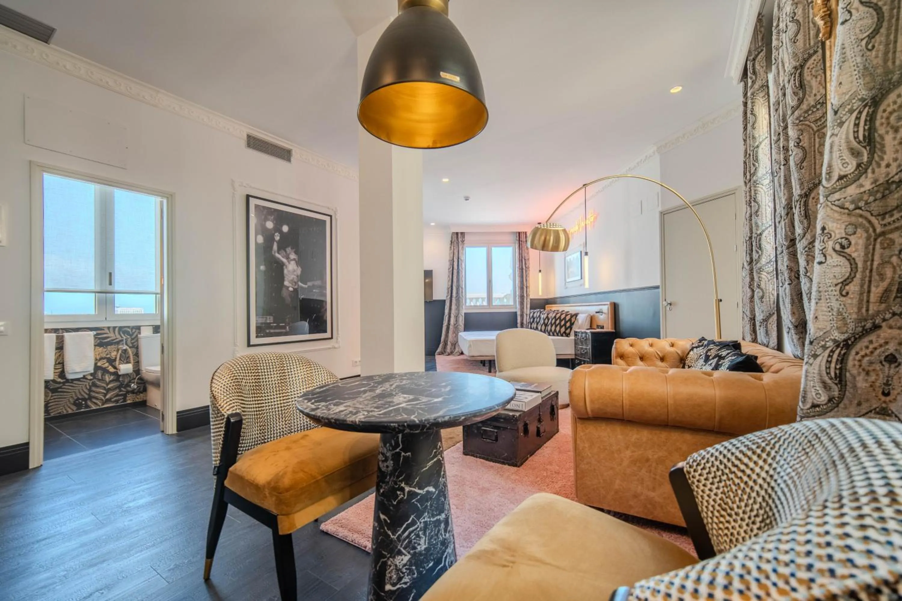 Photo of the whole room in Apartamentos Soho Boutique Hoy No Me Puedo Levantar