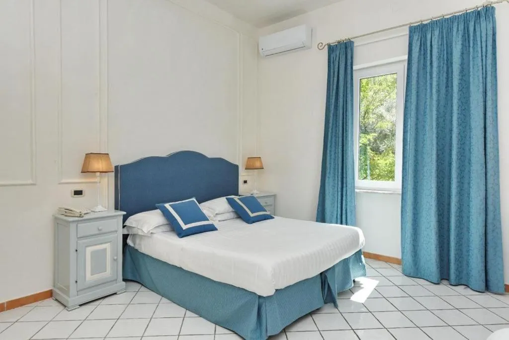 Bed in Hotel Garden Riviera