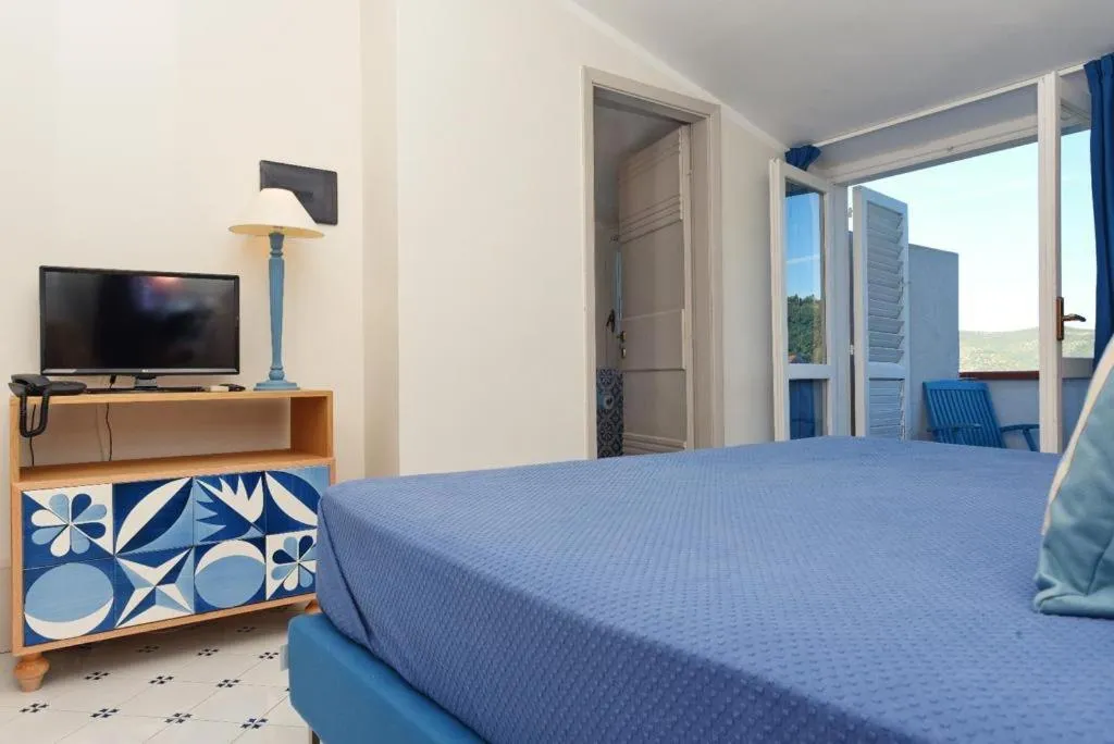 Bed in Hotel Garden Riviera