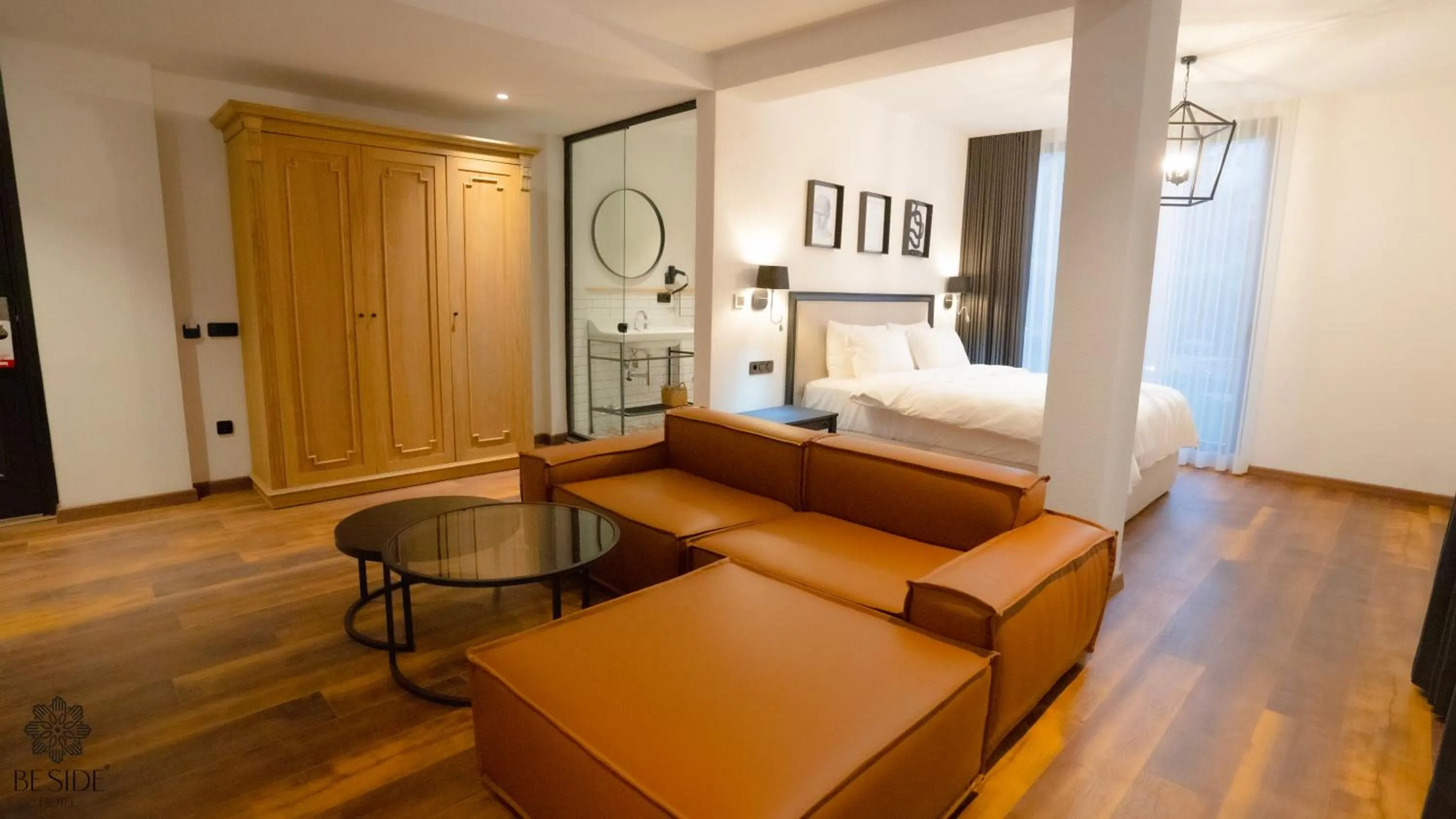 Seating area, Bed in Be Side Hotel