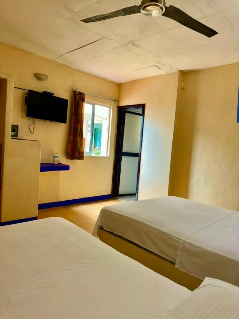 Bed in Hotel Zihuatanejo Centro