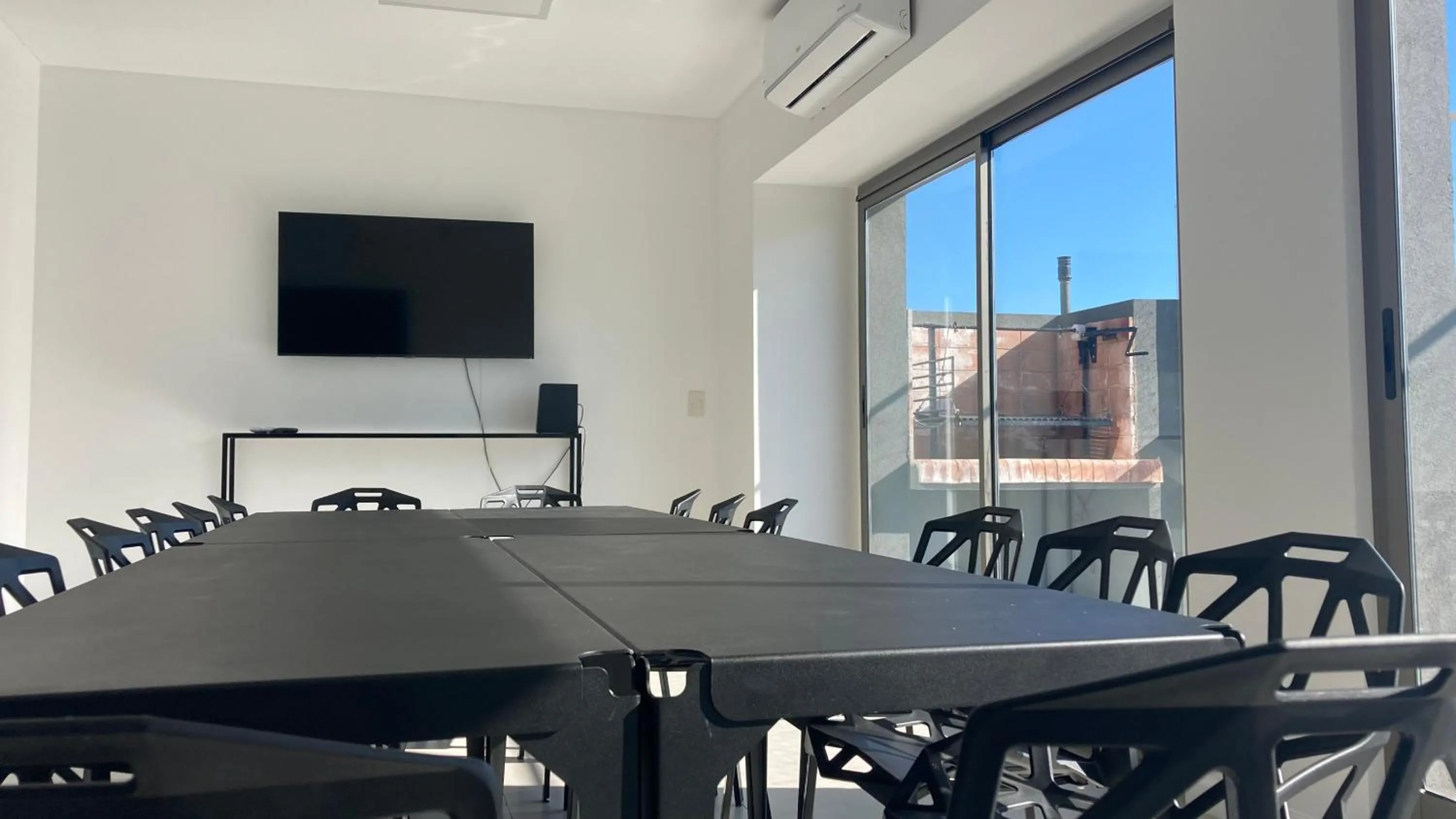 Communal lounge/ TV room in Babel Pampa