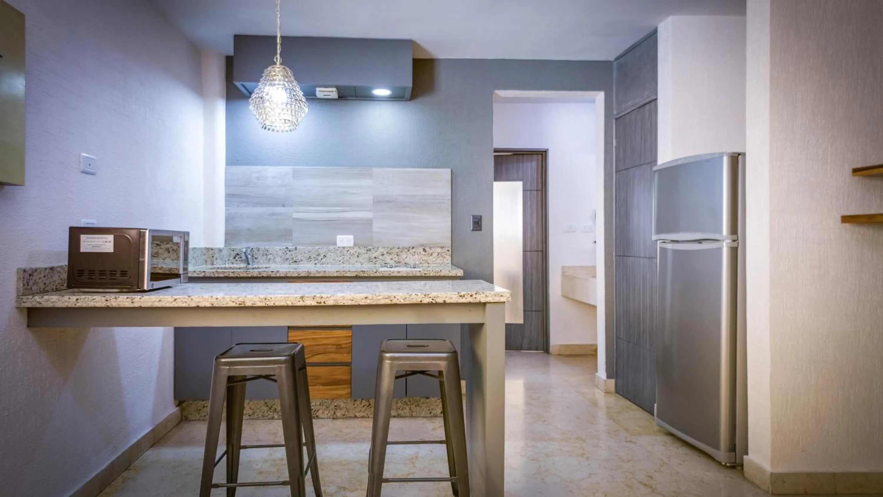 Kitchen or kitchenette in Homesuites Rotarismo