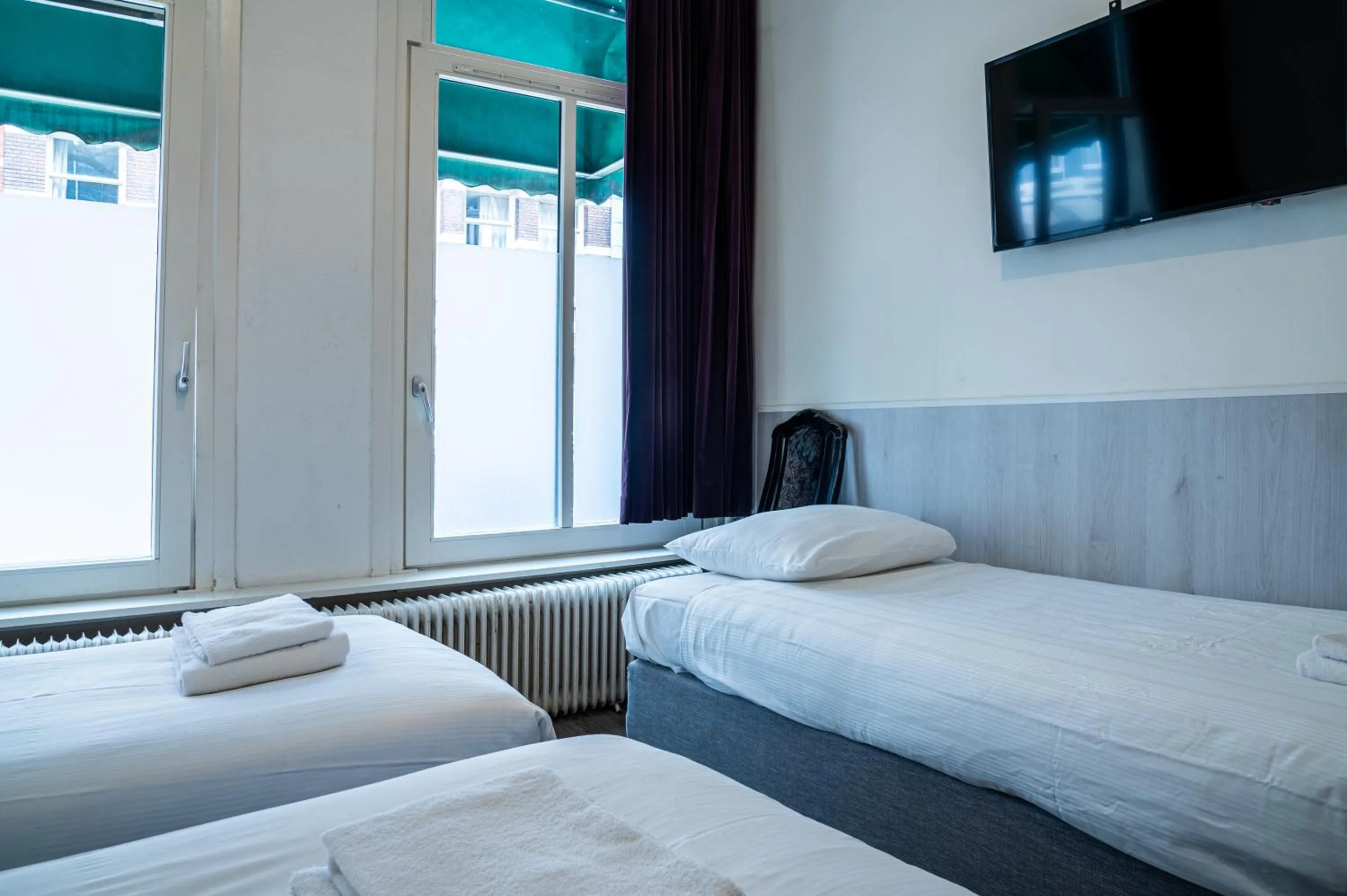 Bed in Hotel Kap City Centre