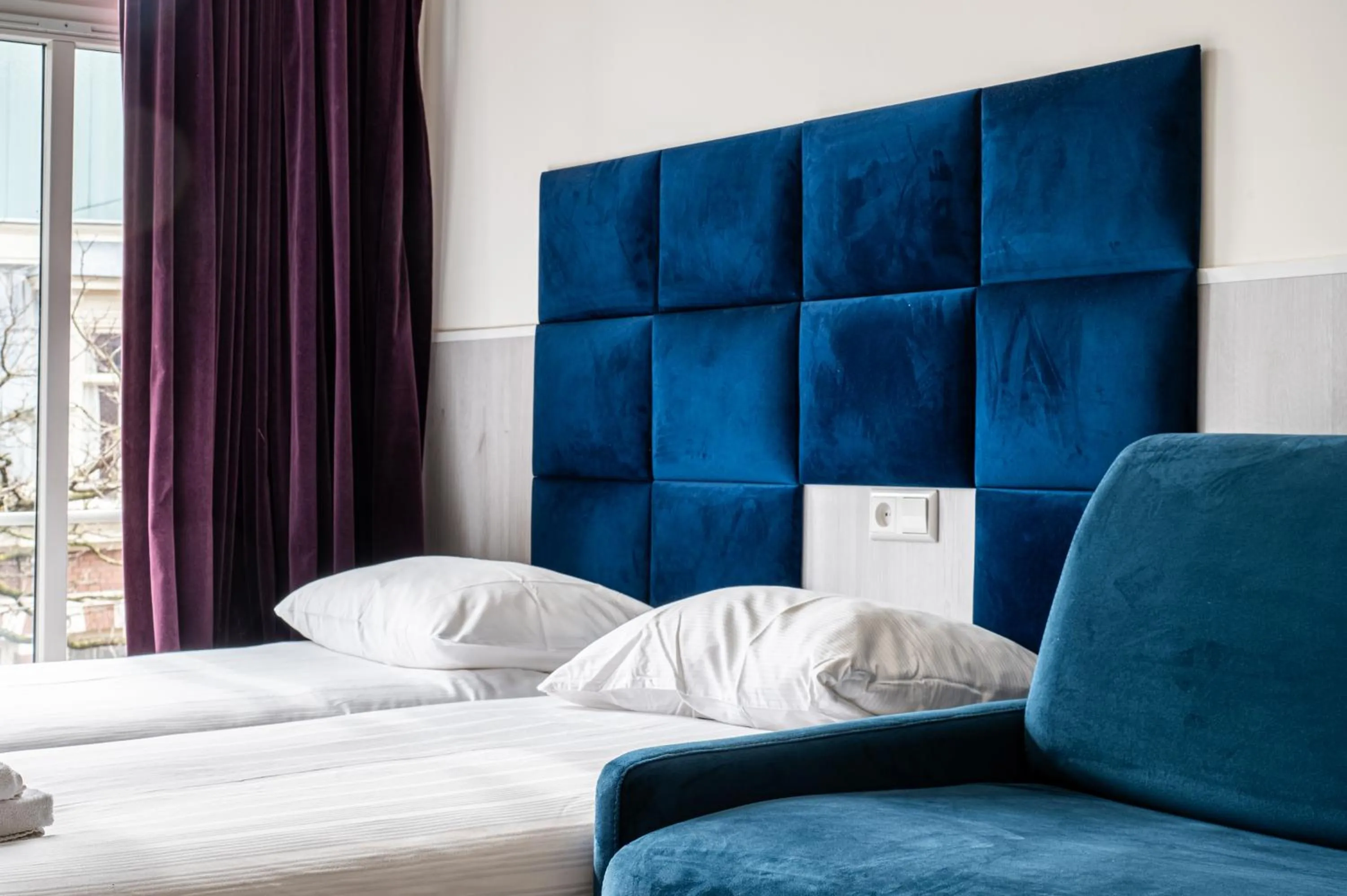 Bed in Hotel Kap City Centre