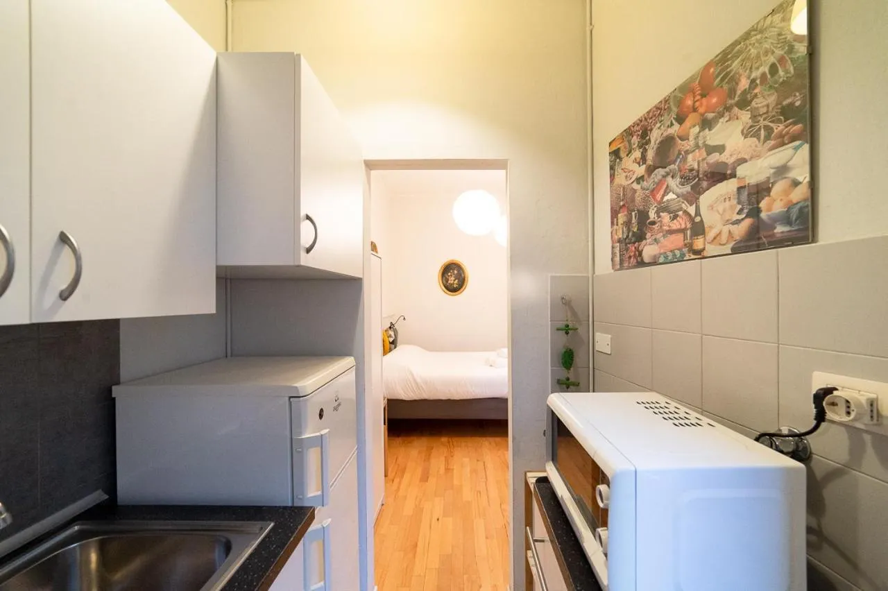 Kitchen or kitchenette, Bed in Hbhall Residenze Darsena