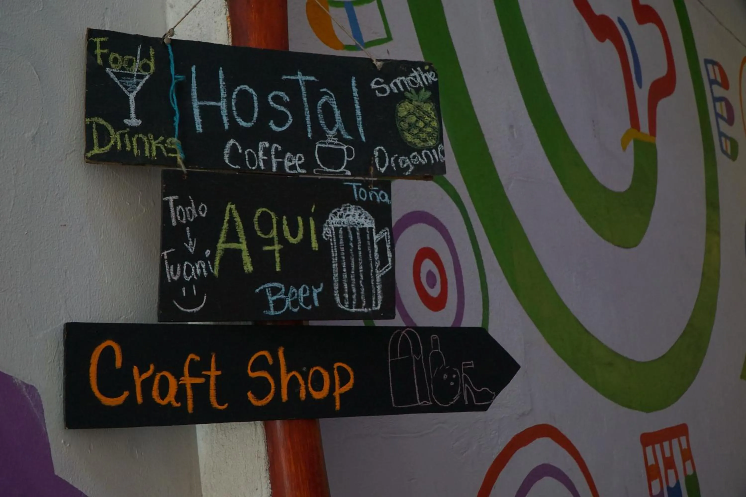 Property logo or sign in Cueva Nica