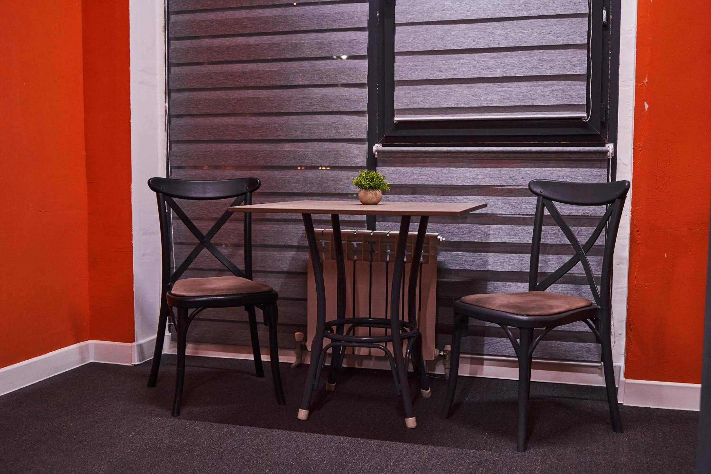 Seating area in Gagarin Capsule Hotel