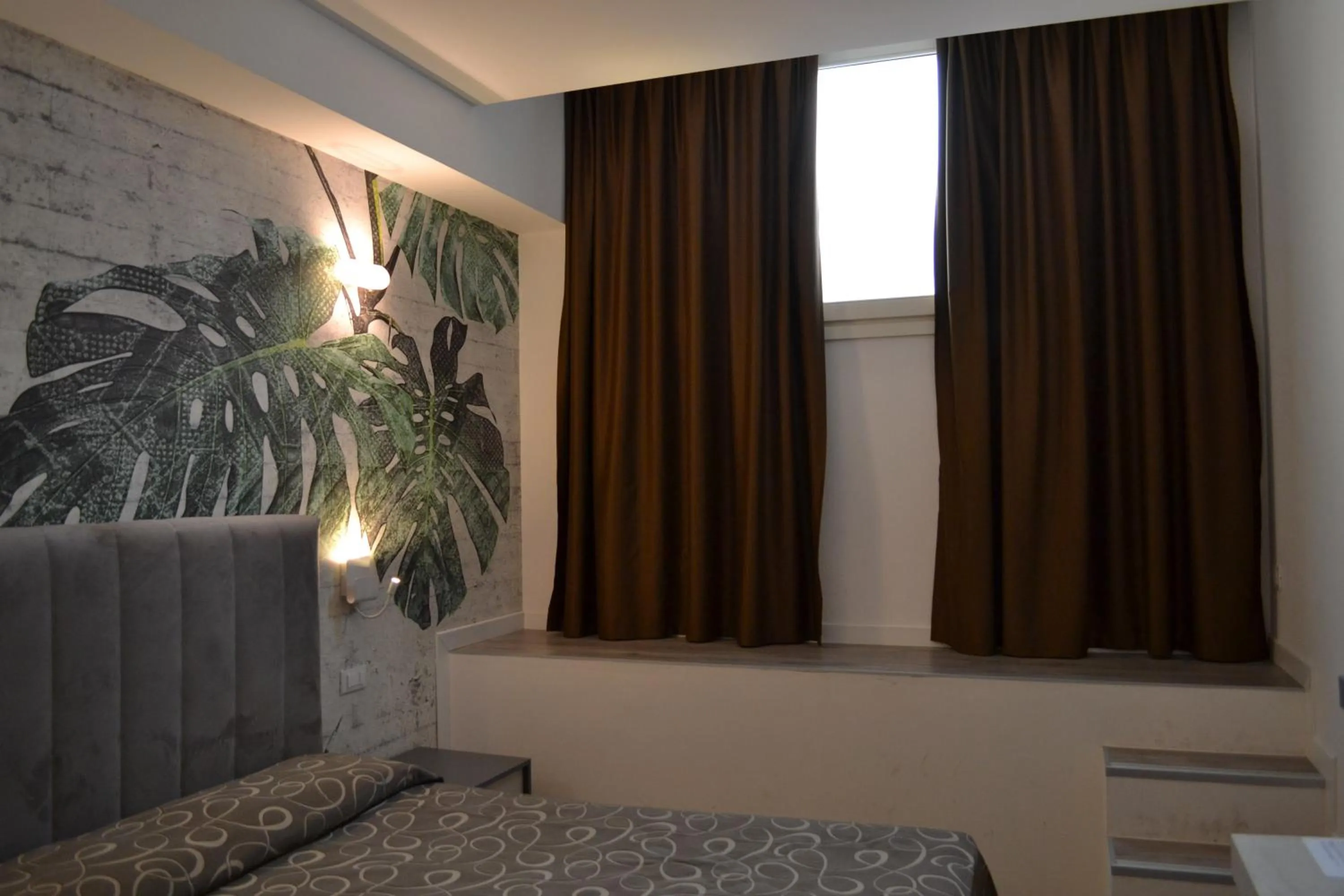 Bed in Hotel Galileo