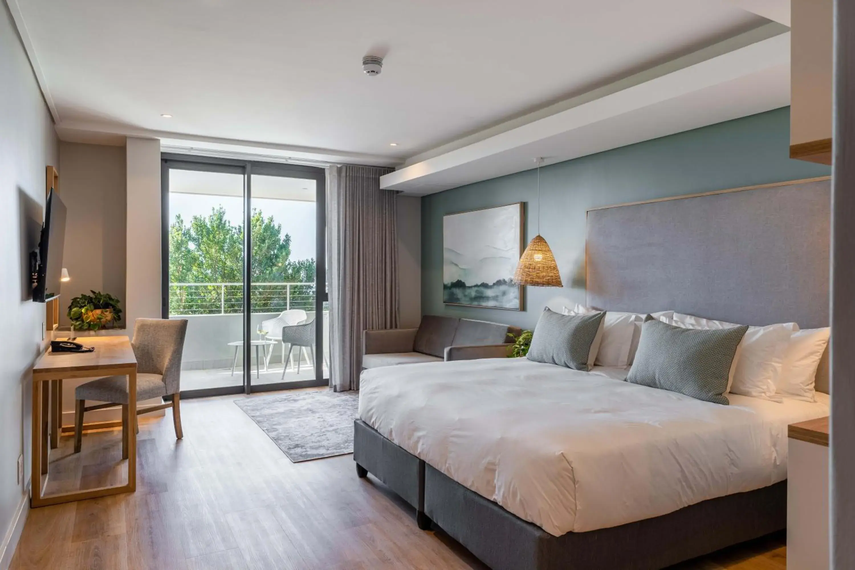 Patio, Bed in Plett Quarter Hotel - Lion Roars Hotels & Lodges Patio, Bed in Plett Quarter Hotel - Lion Roars Hotels & Lodges