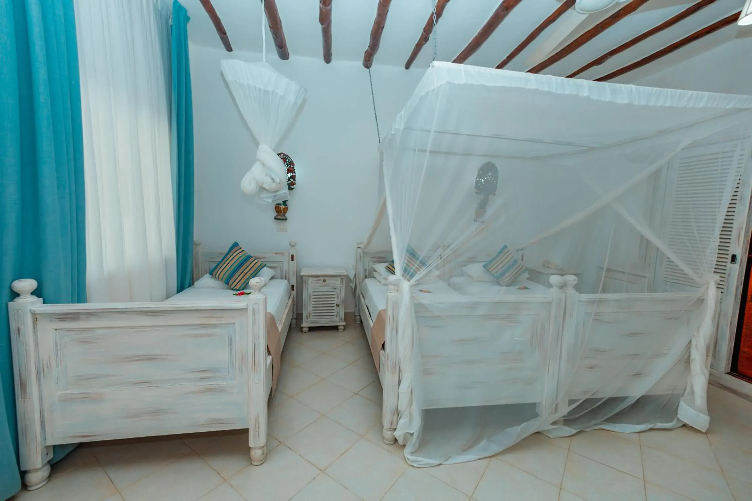 Triple Room in Twiga Beach Resort Triple Room in Twiga Beach Resort