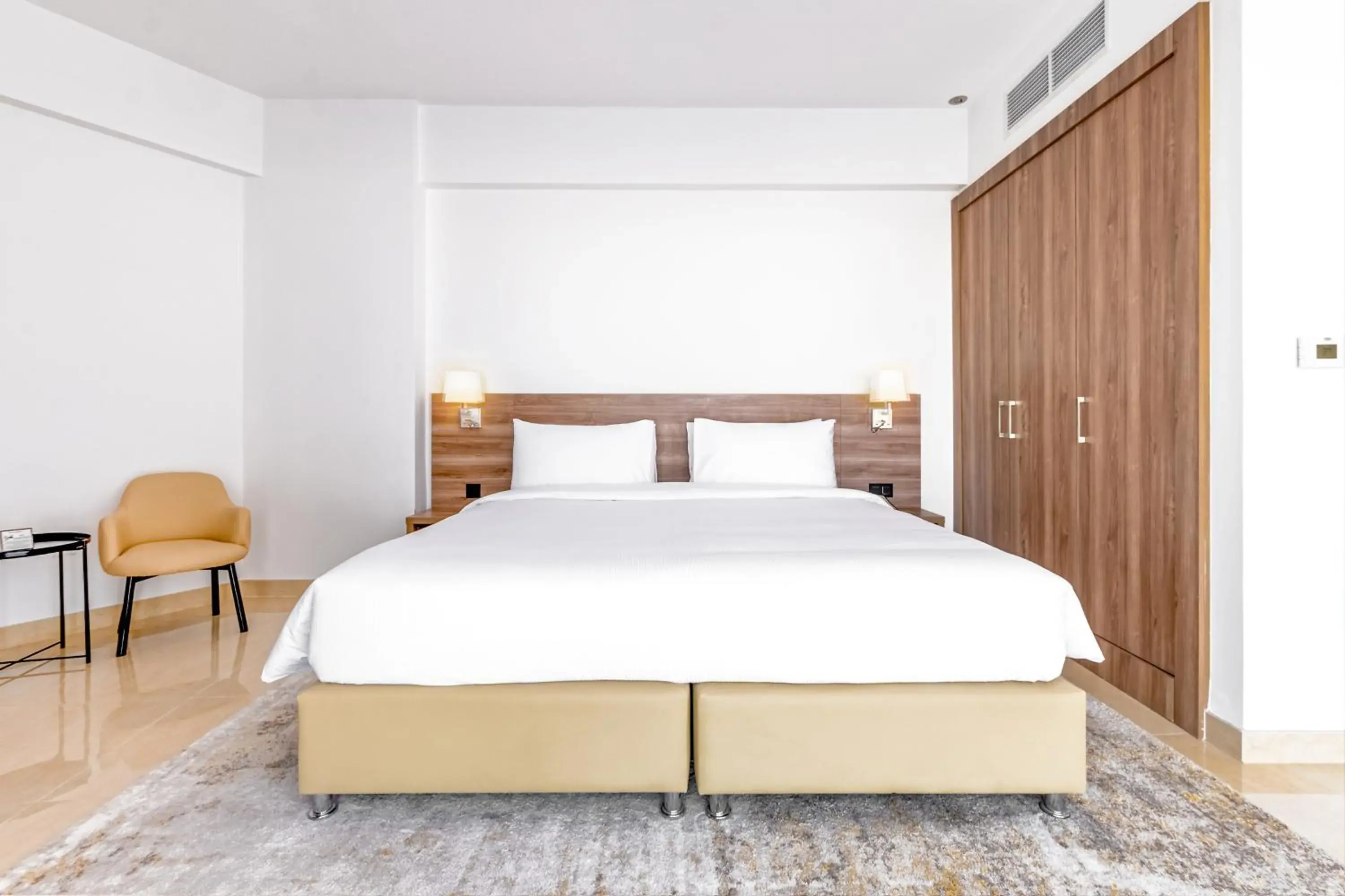 Bed in Pyramisa Hotel Apartments Bed in Pyramisa Hotel Apartments