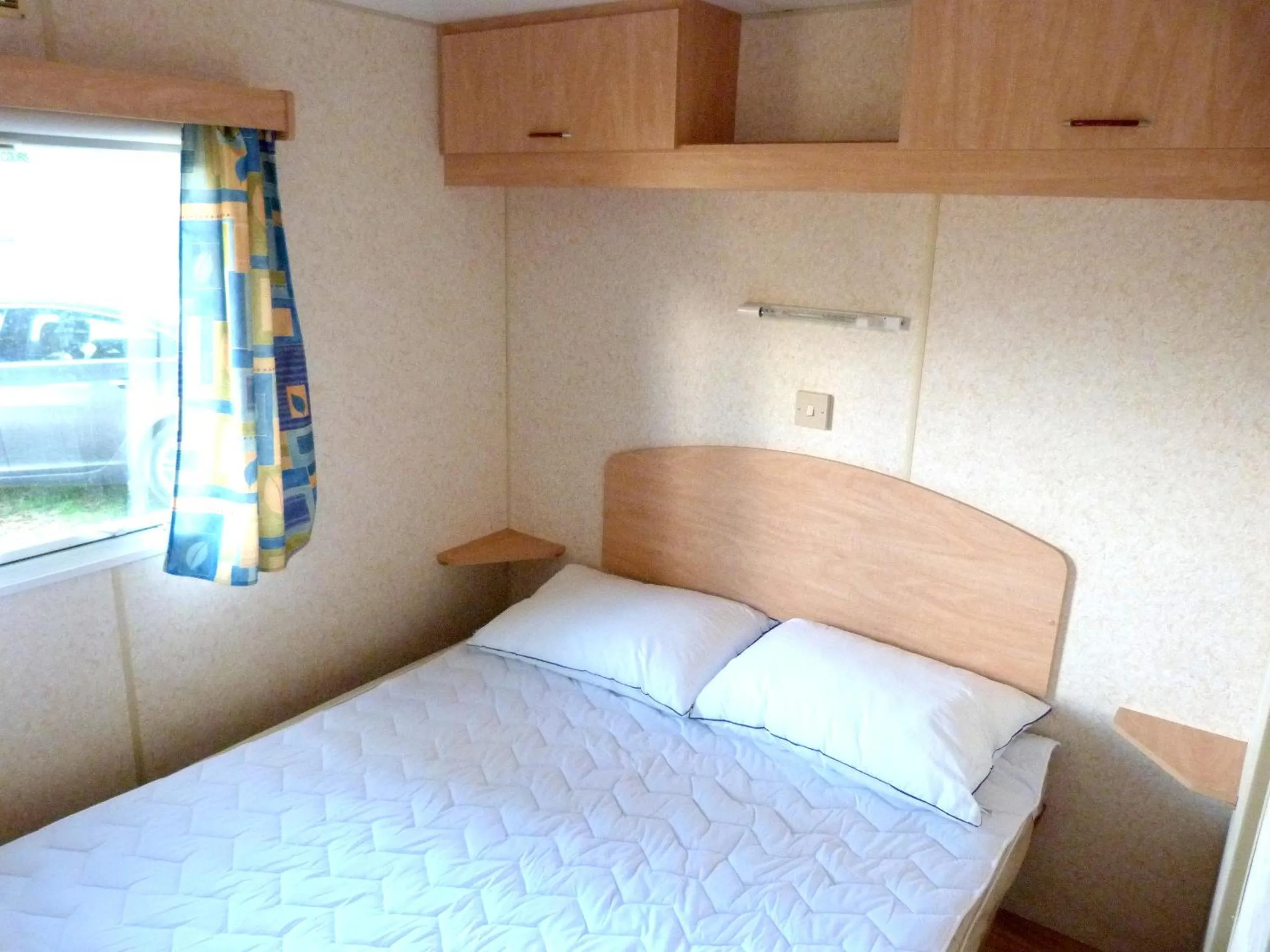 Bedroom in Camping Media Mobile Homes in Brioni Sunny Camping