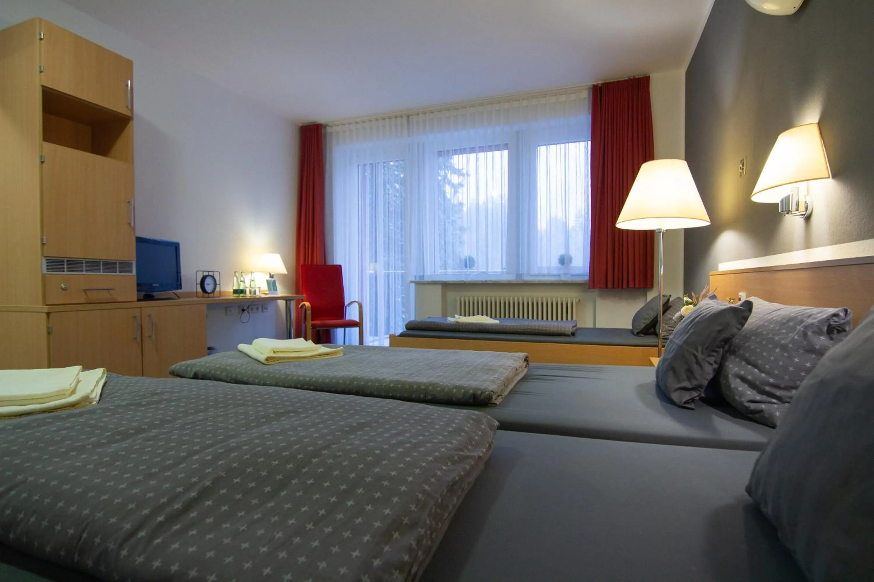 Bed in Green Night Hotel