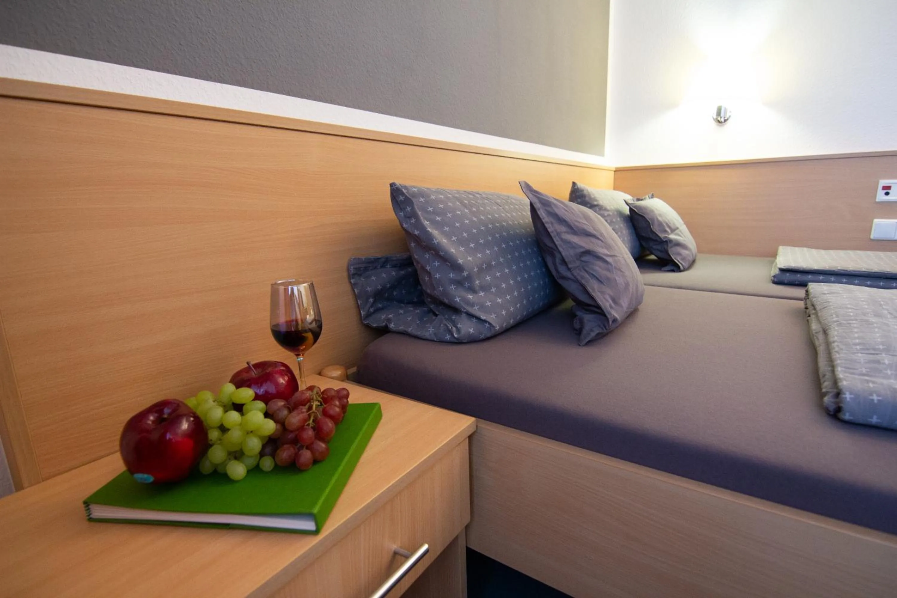 Bed in Green Night Hotel