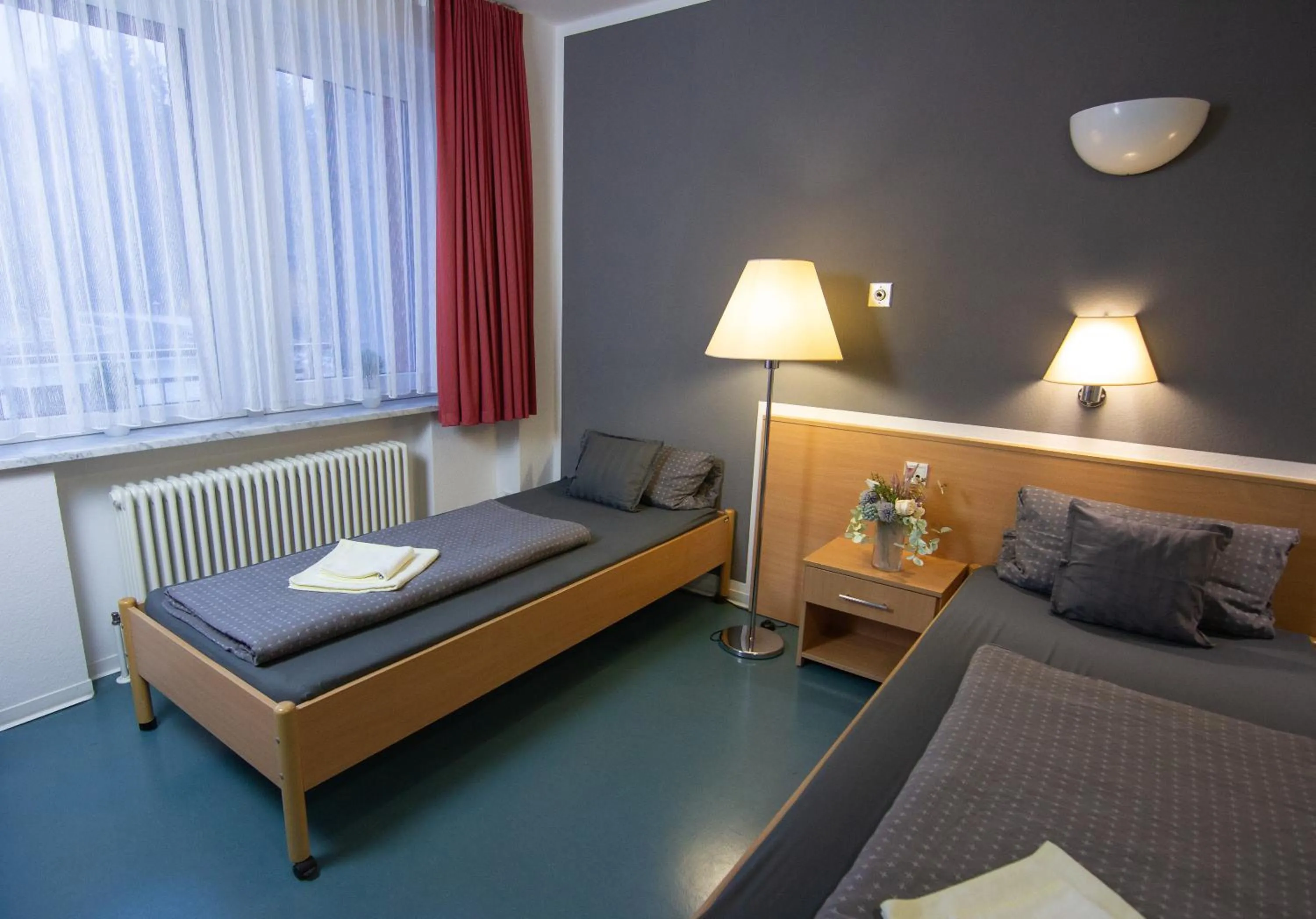 Bed in Green Night Hotel