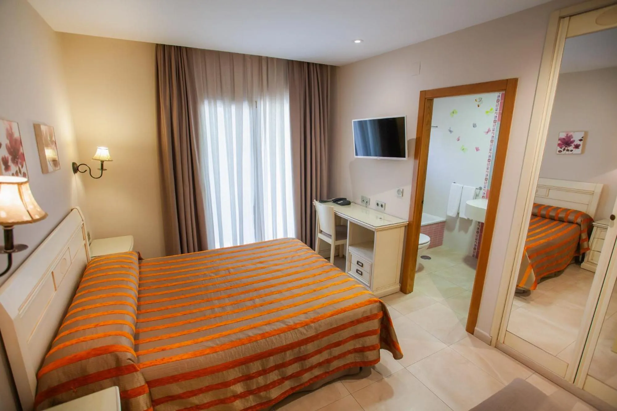 Bed in Hotel Versalles