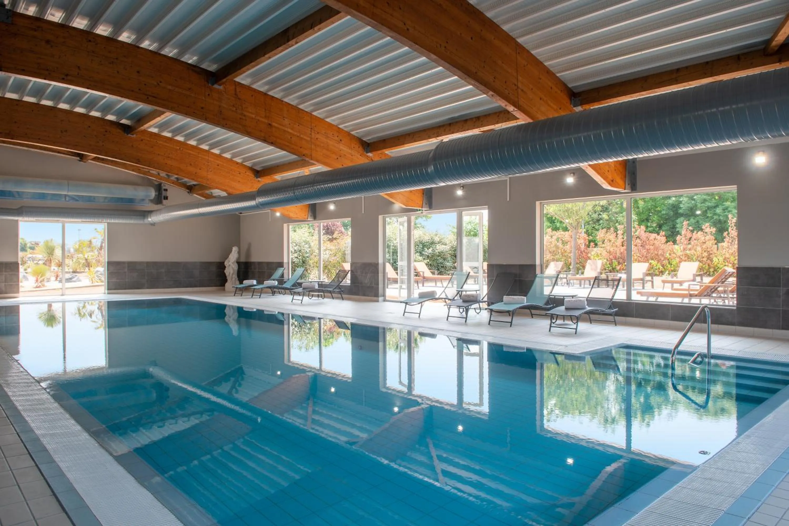 Swimming pool in Golden Tulip Dieppe Hôtel & Spa
