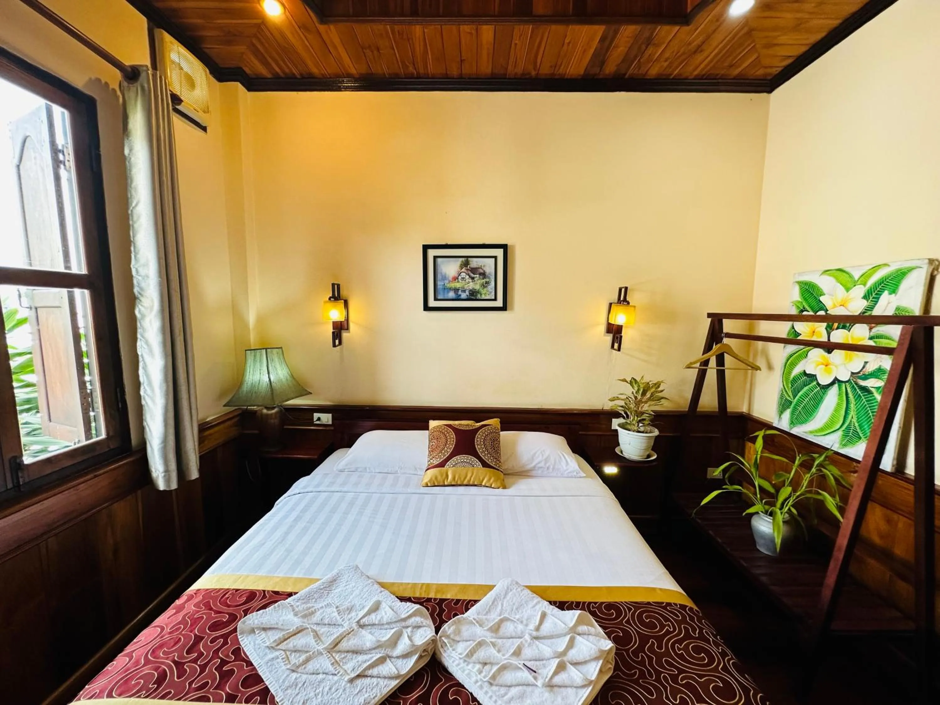 Bed in Ammata Boutique Villa