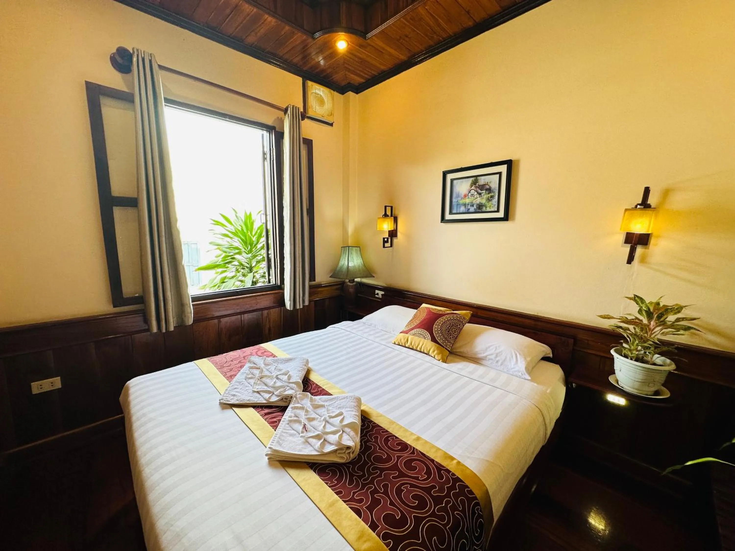 Bed in Ammata Boutique Villa